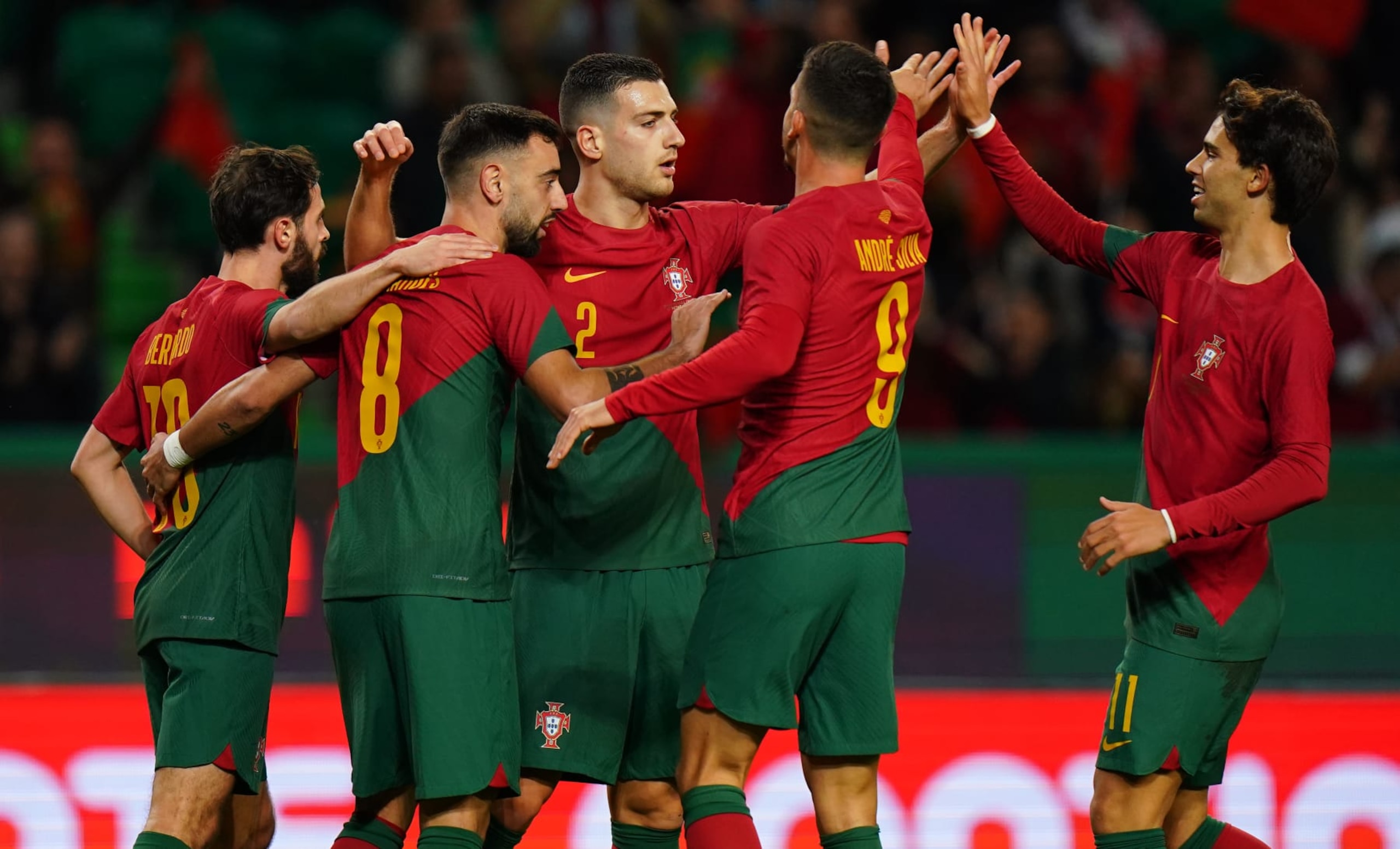 LISBON, PORTUGAL - NOVEMBER 17: Bruno Fernandes of Portugal celebrates with teammates after scoring a goal during the International Friendly match between Portugal and Nigeria at Estadio Jose Alvalade on November 17, 2022 in Lisbon, Portugal. (Photo by Gualter Fatia/Getty Images) LISBON, PORTUGAL - NOVEMBER 17: Bruno Fernandes of Portugal celebrates with teammates after scoring a goal during the International Friendly match between Portugal and Nigeria at Estadio Jose Alvalade on November 17, 2022 in Lisbon, Portugal. (Photo by Gualter Fatia/Getty Images)