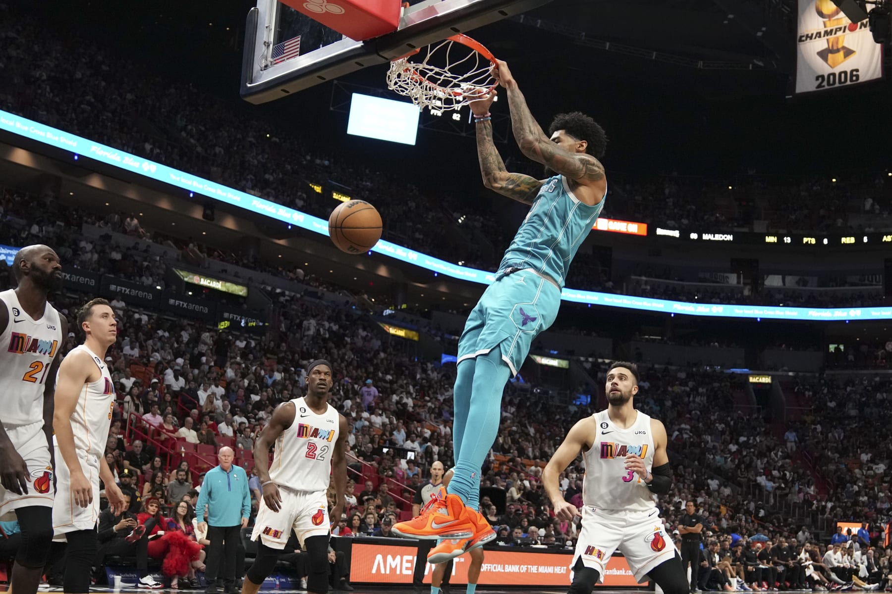 MIAMI, FL - NOVEMBER 12: Nick Richards #4 of the Charlotte Hornets dunks the basketball during the second half against the Miami Heat at FTX Arena on November 12, 2022 in Miami, Florida. NOTE TO USER: User expressly acknowledges and agrees that,  by downloading and or using this photograph,  User is consenting to the terms and conditions of the Getty Images License Agreement.(Photo by Eric Espada/Getty Images)