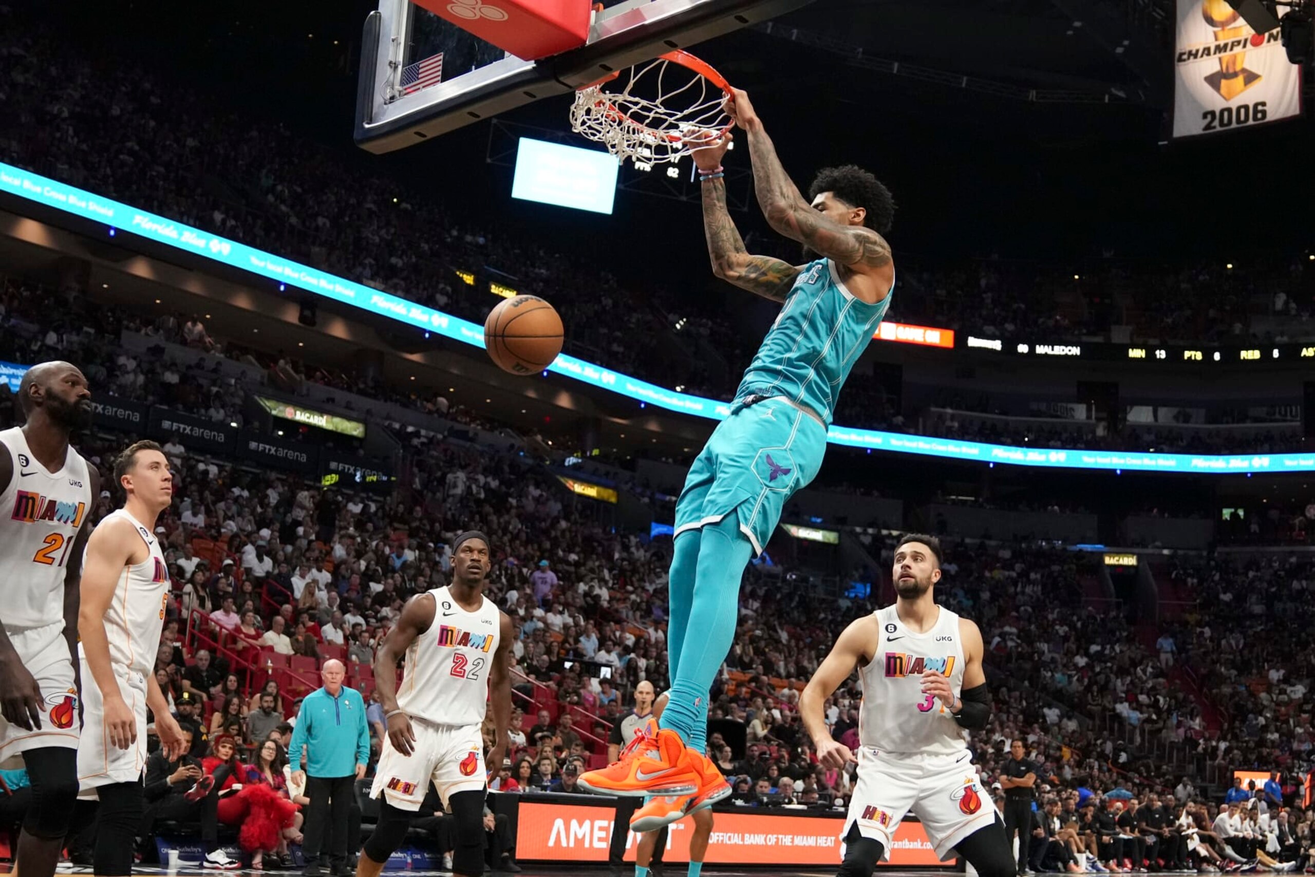 MIAMI, FL - NOVEMBER 12: Nick Richards #4 of the Charlotte Hornets dunks the basketball during the second half against the Miami Heat at FTX Arena on November 12, 2022 in Miami, Florida. NOTE TO USER: User expressly acknowledges and agrees that,  by downloading and or using this photograph,  User is consenting to the terms and conditions of the Getty Images License Agreement.(Photo by Eric Espada/Getty Images)