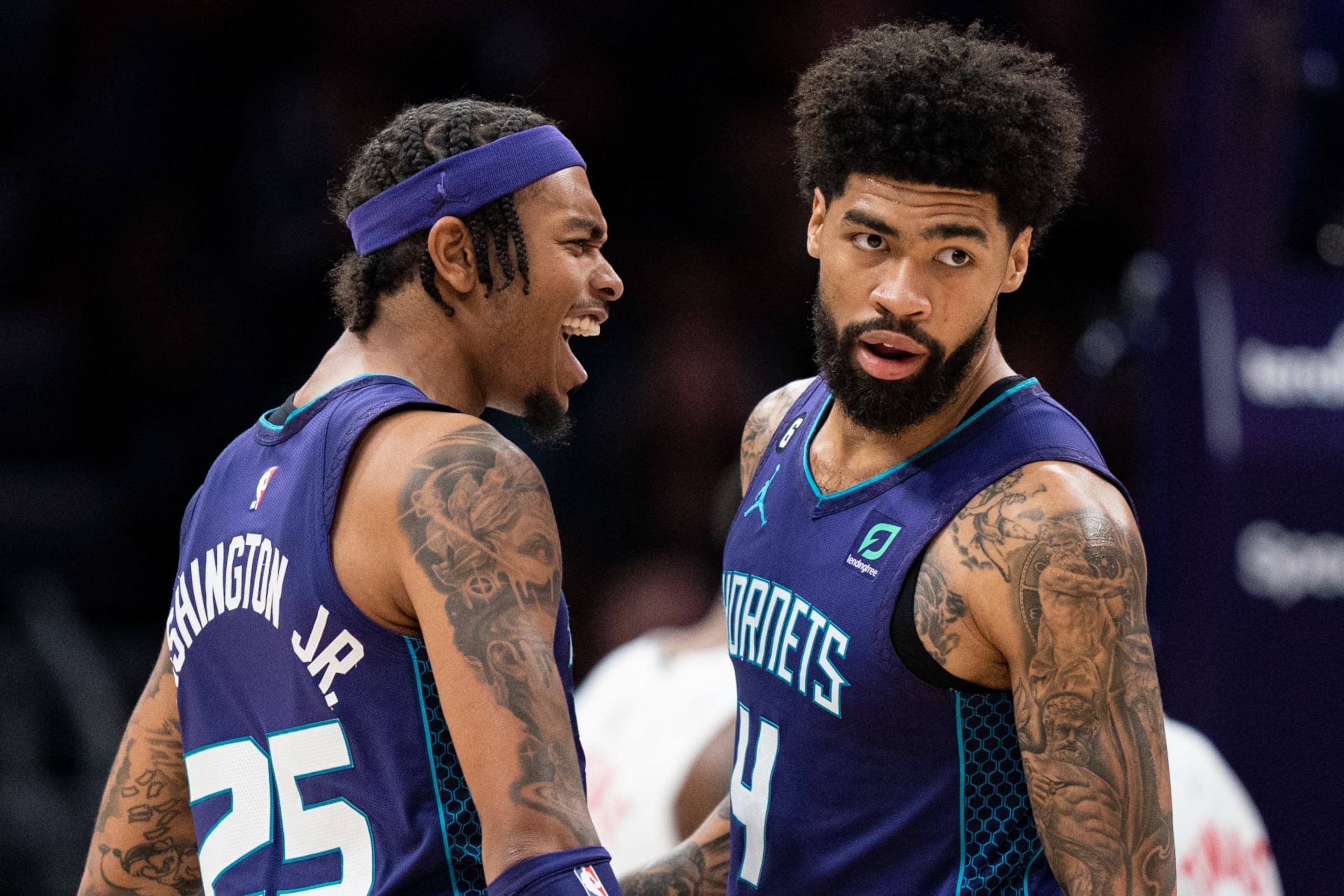 CHARLOTTE, NORTH CAROLINA - NOVEMBER 05: P.J. Washington #25 celebrates with Nick Richards #4 of the Charlotte Hornets in the fourth quarter during their game against the Brooklyn Nets at Spectrum Center on November 05, 2022 in Charlotte, North Carolina. NOTE TO USER: User expressly acknowledges and agrees that, by downloading and or using this photograph, User is consenting to the terms and conditions of the Getty Images License Agreement. (Photo by Jacob Kupferman/Getty Images)