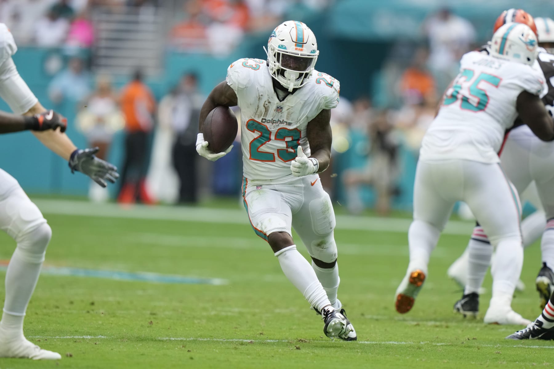 Miami Dolphins running back Jeff Wilson Jr. (23) runs a play during the first half of an NFL football game against the Cleveland Browns, Sunday, Nov. 13, 2022, in Miami Gardens, Fla. (AP Photo/Lynne Sladky)