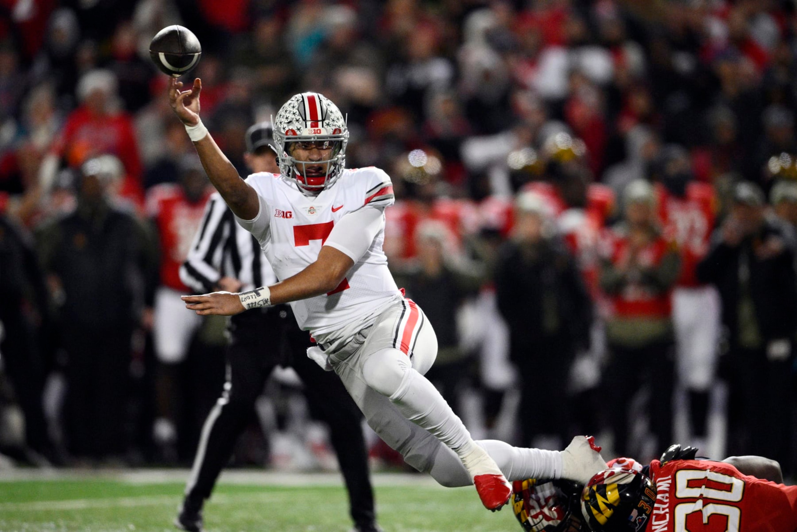 Ohio State quarterback C.J. Stroud (7) throws the ball away during the second half of an NCAA college football game against Maryland, Saturday, Nov. 19, 2022, in College Park, Md. Ohio State won 43-30. (AP Photo/Nick Wass)