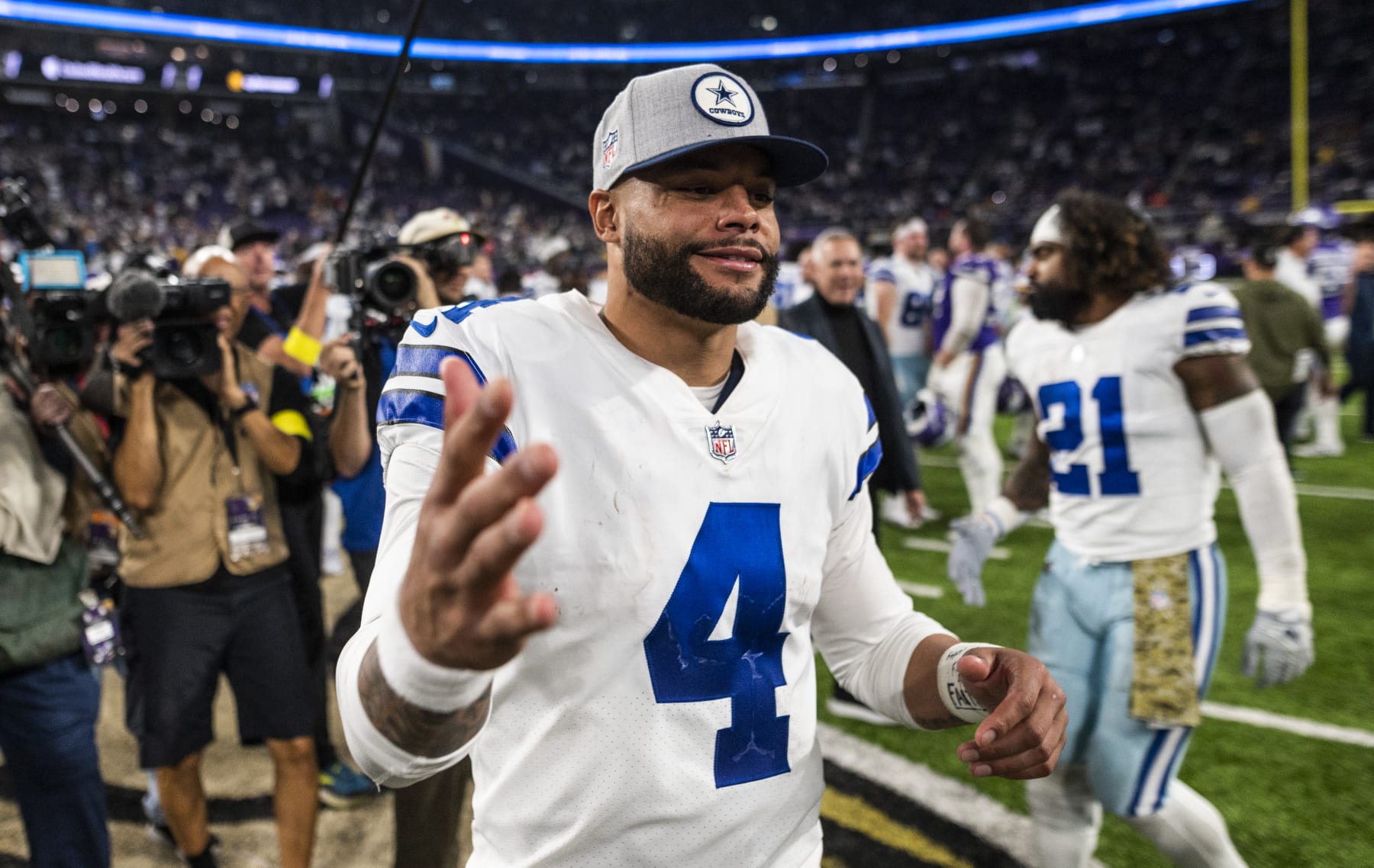 MINNEAPOLIS, MN - NOVEMBER 20: Dak Prescott #4 of the Dallas Cowboys greets players after the game against the Minnesota Vikings at U.S. Bank Stadium on November 20, 2022 in Minneapolis, Minnesota. (Photo by Stephen Maturen/Getty Images)
