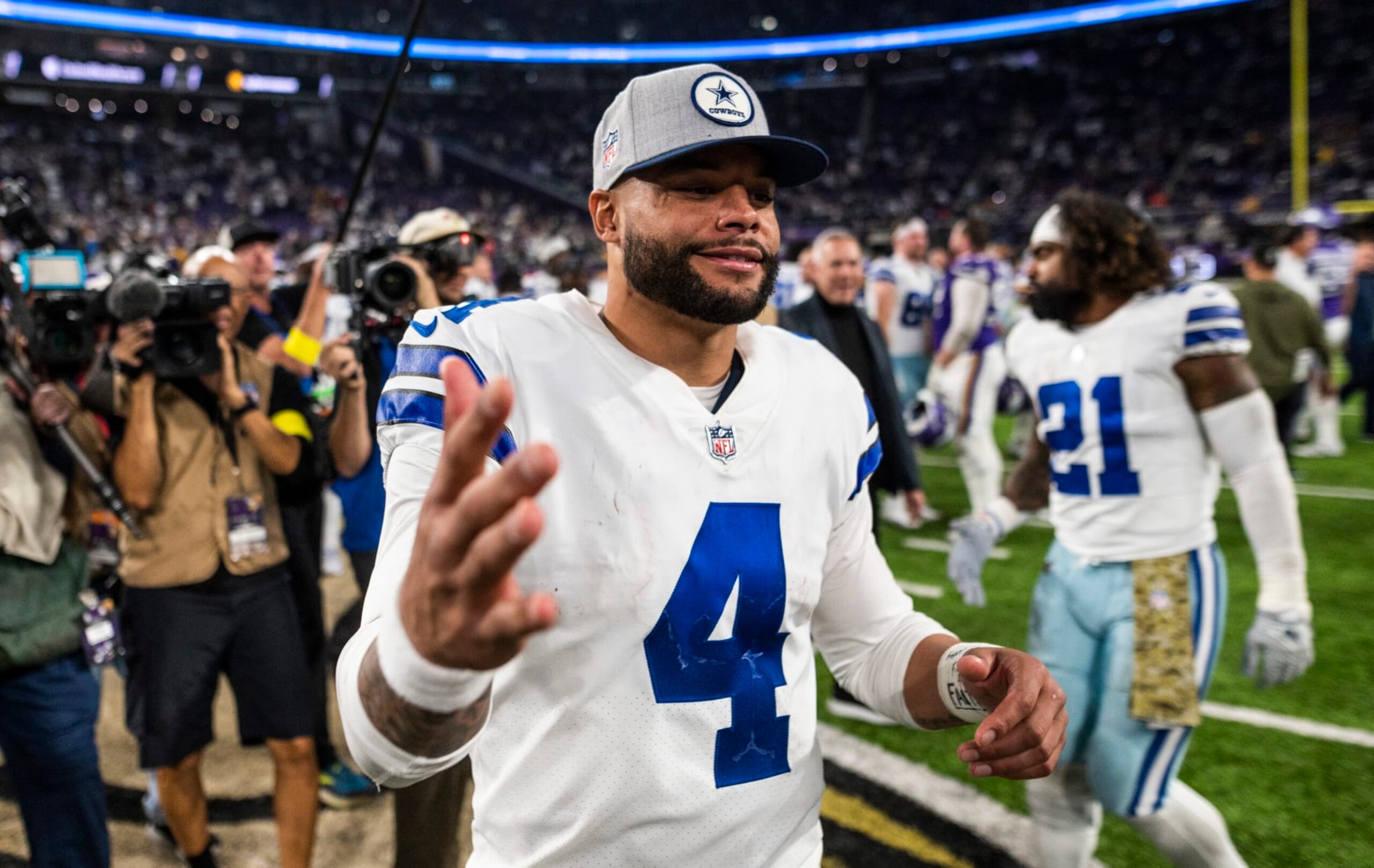 MINNEAPOLIS, MN - NOVEMBER 20: Dak Prescott #4 of the Dallas Cowboys greets players after the game against the Minnesota Vikings at U.S. Bank Stadium on November 20, 2022 in Minneapolis, Minnesota. (Photo by Stephen Maturen/Getty Images)