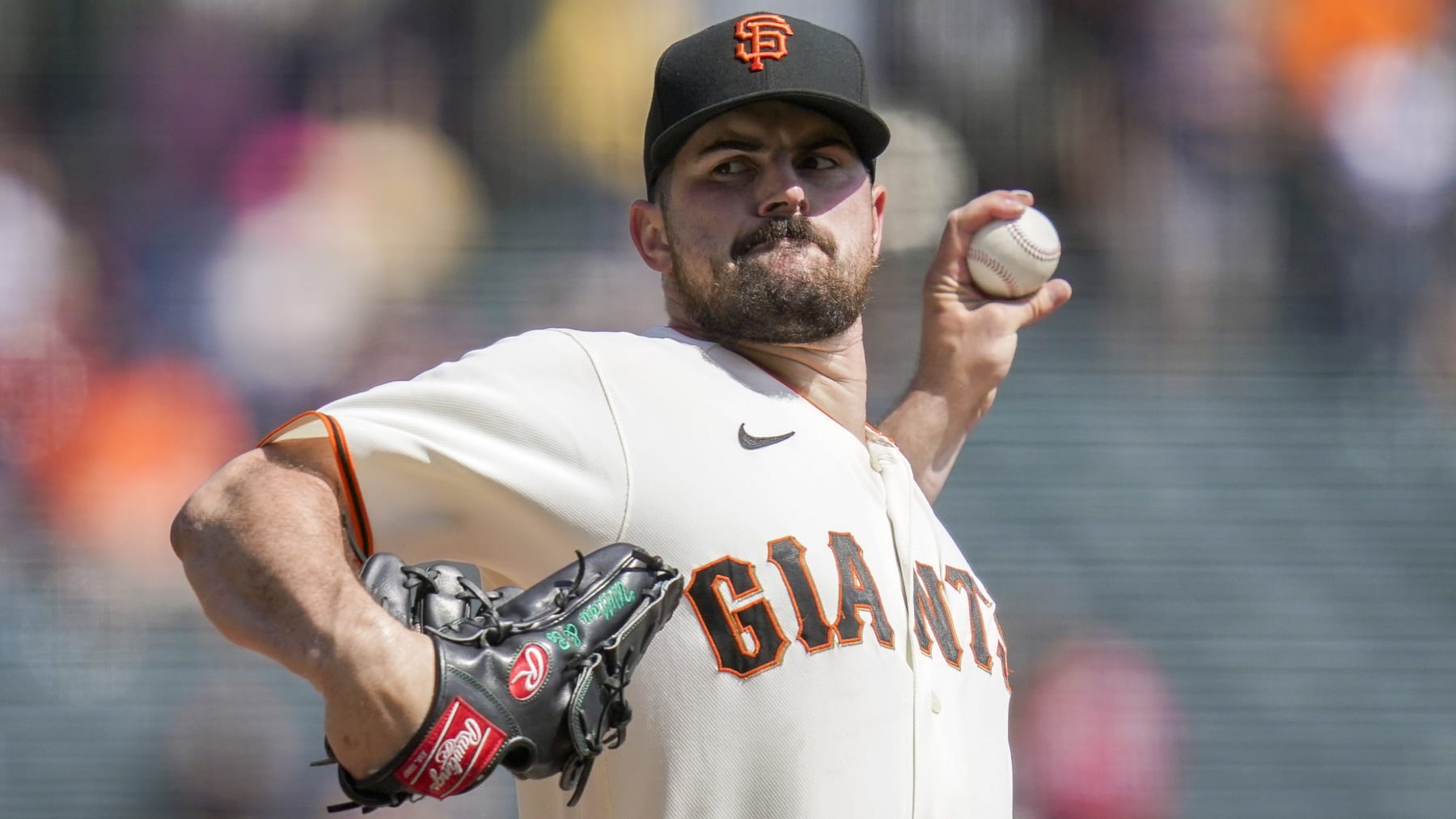 San Francisco Giants' Carlos Rodón pitches against the Atlanta Braves during the first inning of a baseball game in San Francisco, Wednesday, Sept. 14, 2022. (AP Photo/Godofredo A. Vásquez)