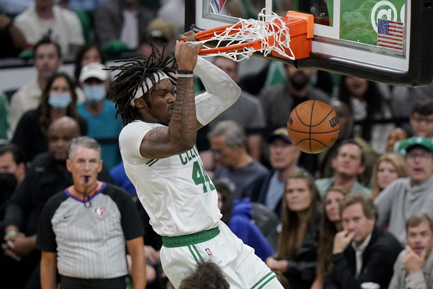 Boston Celtics center Robert Williams III (44) dunks the ball against the Golden State Warriors during the second quarter of Game 3 of basketball's NBA Finals, Wednesday, June 8, 2022, in Boston. (AP Photo/Steven Senne)