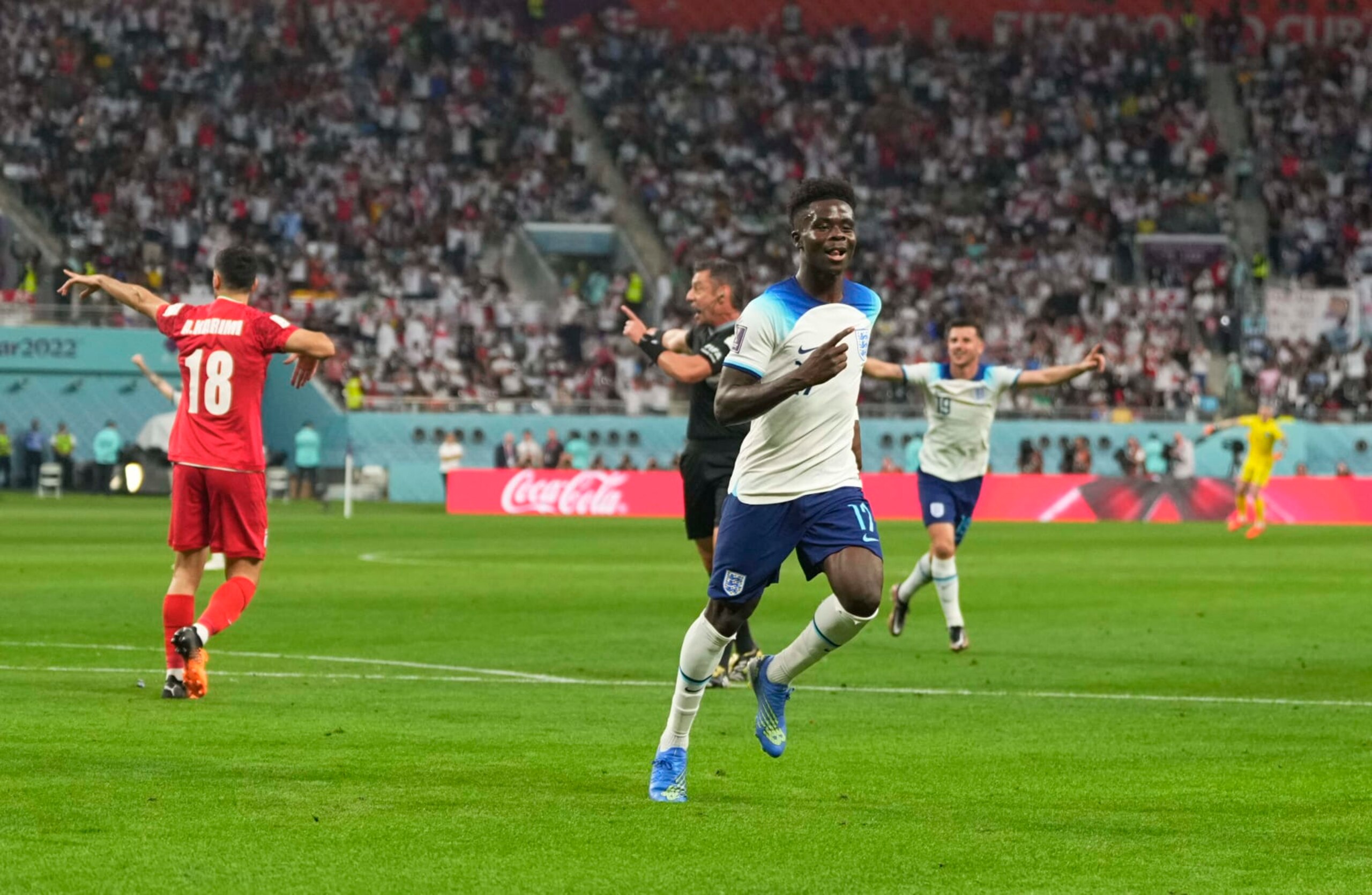 DOHA, QATAR - NOVEMBER 21: Bukayo Saka celebrates scoring his teams second goal during the FIFA World Cup Qatar 2022 Group B match between England and IR Iran at Khalifa International Stadium on November 21, 2022 in Doha, Qatar. (Photo by Ulrik Pedersen/DeFodi Images via Getty Images) DOHA, QATAR - NOVEMBER 21: Bukayo Saka celebrates scoring his teams second goal during the FIFA World Cup Qatar 2022 Group B match between England and IR Iran at Khalifa International Stadium on November 21, 2022 in Doha, Qatar. (Photo by Ulrik Pedersen/DeFodi Images via Getty Images)