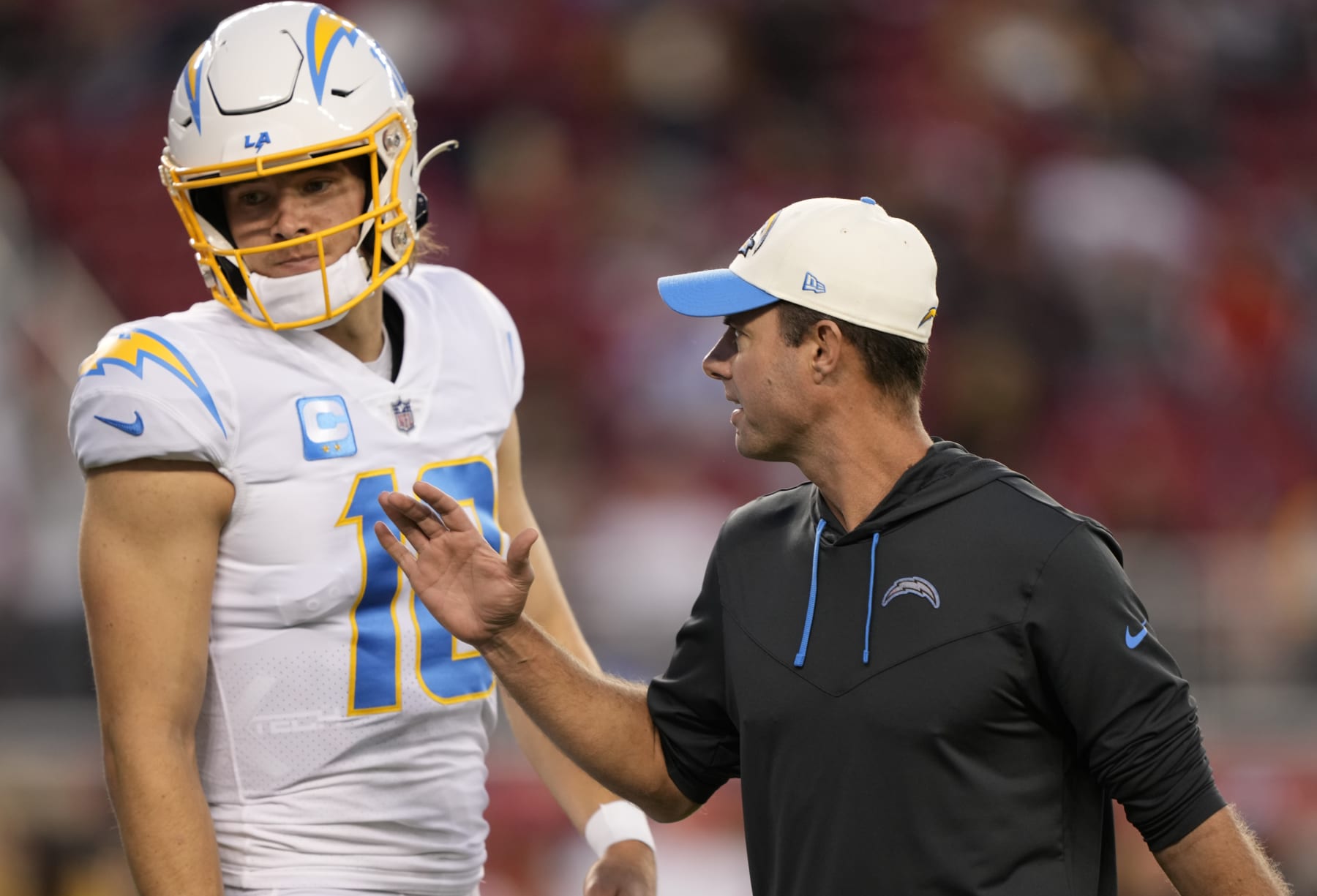 SANTA CLARA, CALIFORNIA - NOVEMBER 13: Head coach Brandon Staley and Justin Herbert #10 of the Los Angeles Chargers are seen on the field prior to the game against the San Francisco 49ers at Levi's Stadium on November 13, 2022 in Santa Clara, California. (Photo by Thearon W. Henderson/Getty Images)