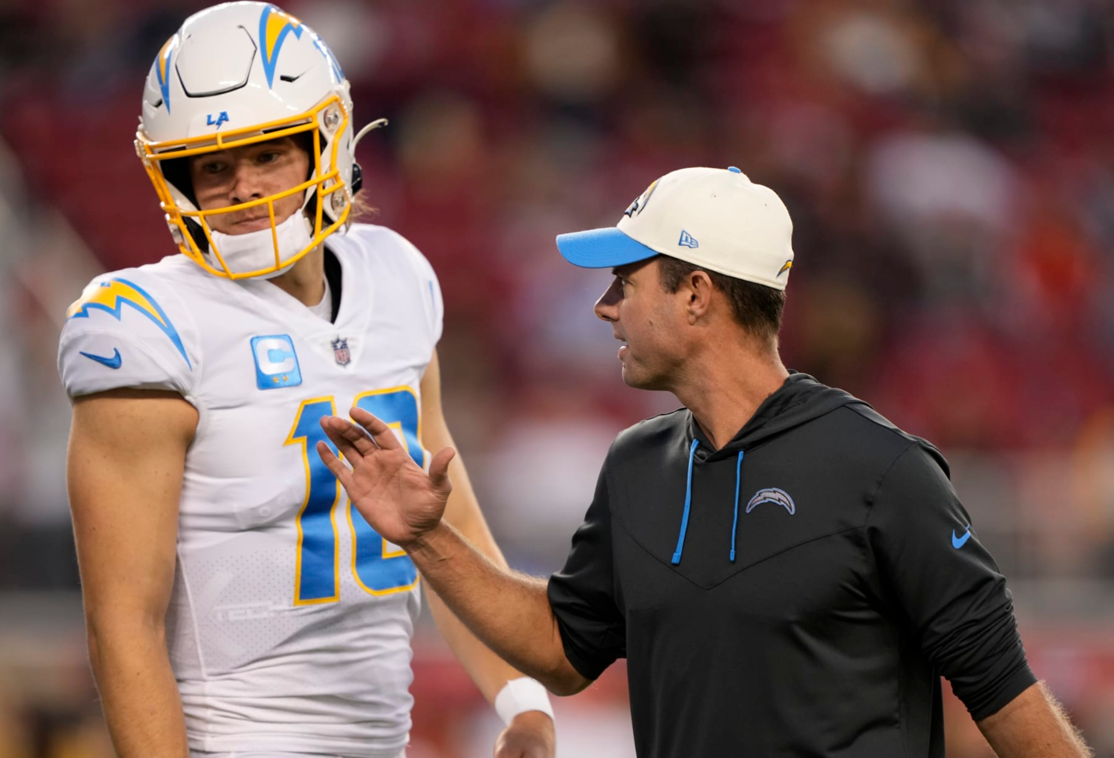 SANTA CLARA, CALIFORNIA - NOVEMBER 13: Head coach Brandon Staley and Justin Herbert #10 of the Los Angeles Chargers are seen on the field prior to the game against the San Francisco 49ers at Levi's Stadium on November 13, 2022 in Santa Clara, California. (Photo by Thearon W. Henderson/Getty Images) SANTA CLARA, CALIFORNIA - NOVEMBER 13: Head coach Brandon Staley and Justin Herbert #10 of the Los Angeles Chargers are seen on the field prior to the game against the San Francisco 49ers at Levi's Stadium on November 13, 2022 in Santa Clara, California. (Photo by Thearon W. Henderson/Getty Images)