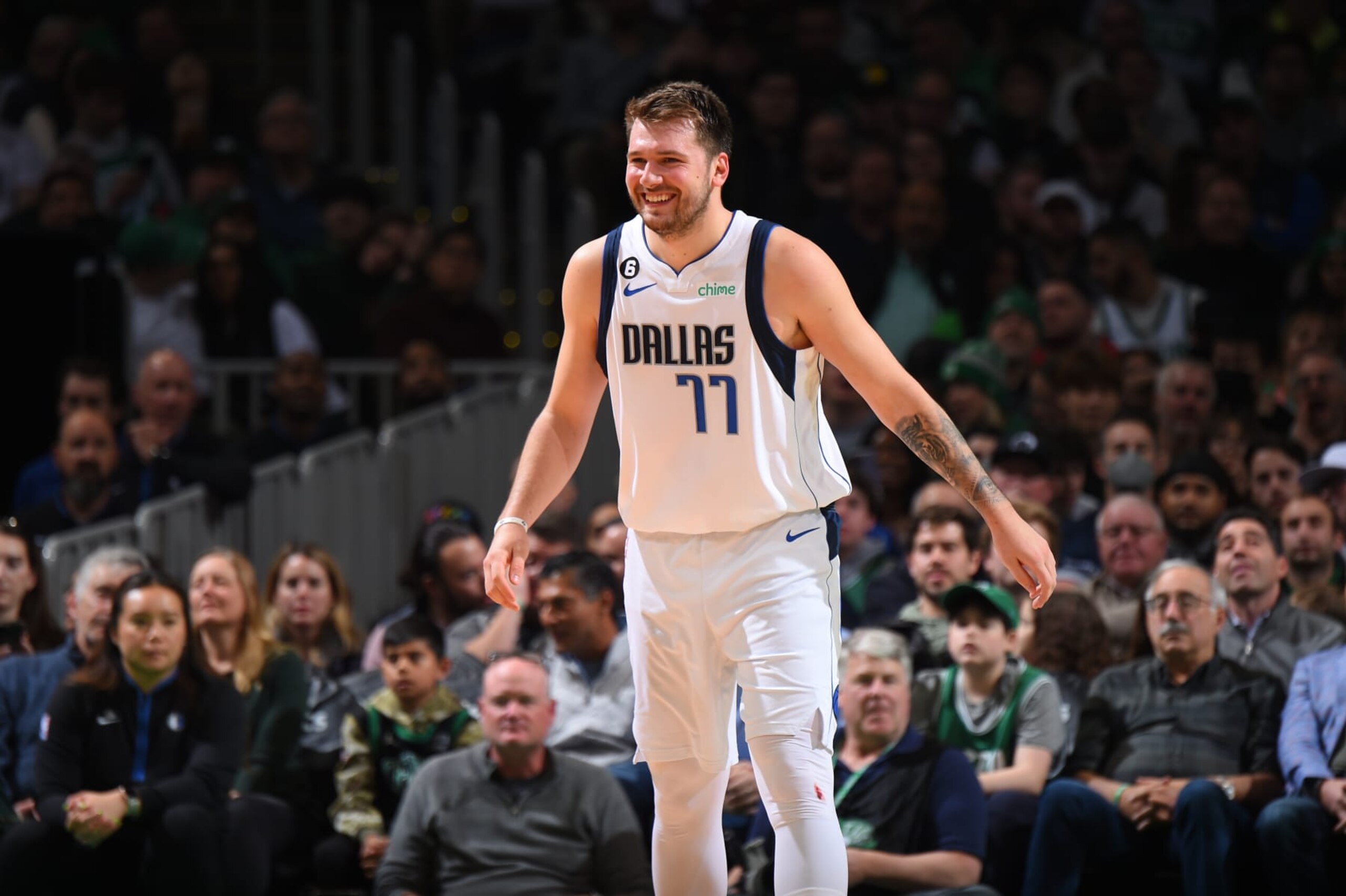 BOSTON, MA - NOVEMBER 23: Luka Doncic #77 of the Dallas Mavericks smiles on the court during the game against the Boston Celtics on November 23, 2022 at the TD Garden in Boston, Massachusetts.  NOTE TO USER: User expressly acknowledges and agrees that, by downloading and or using this photograph, User is consenting to the terms and conditions of the Getty Images License Agreement. Mandatory Copyright Notice: Copyright 2022 NBAE  (Photo by Brian Babineau/NBAE via Getty Images)