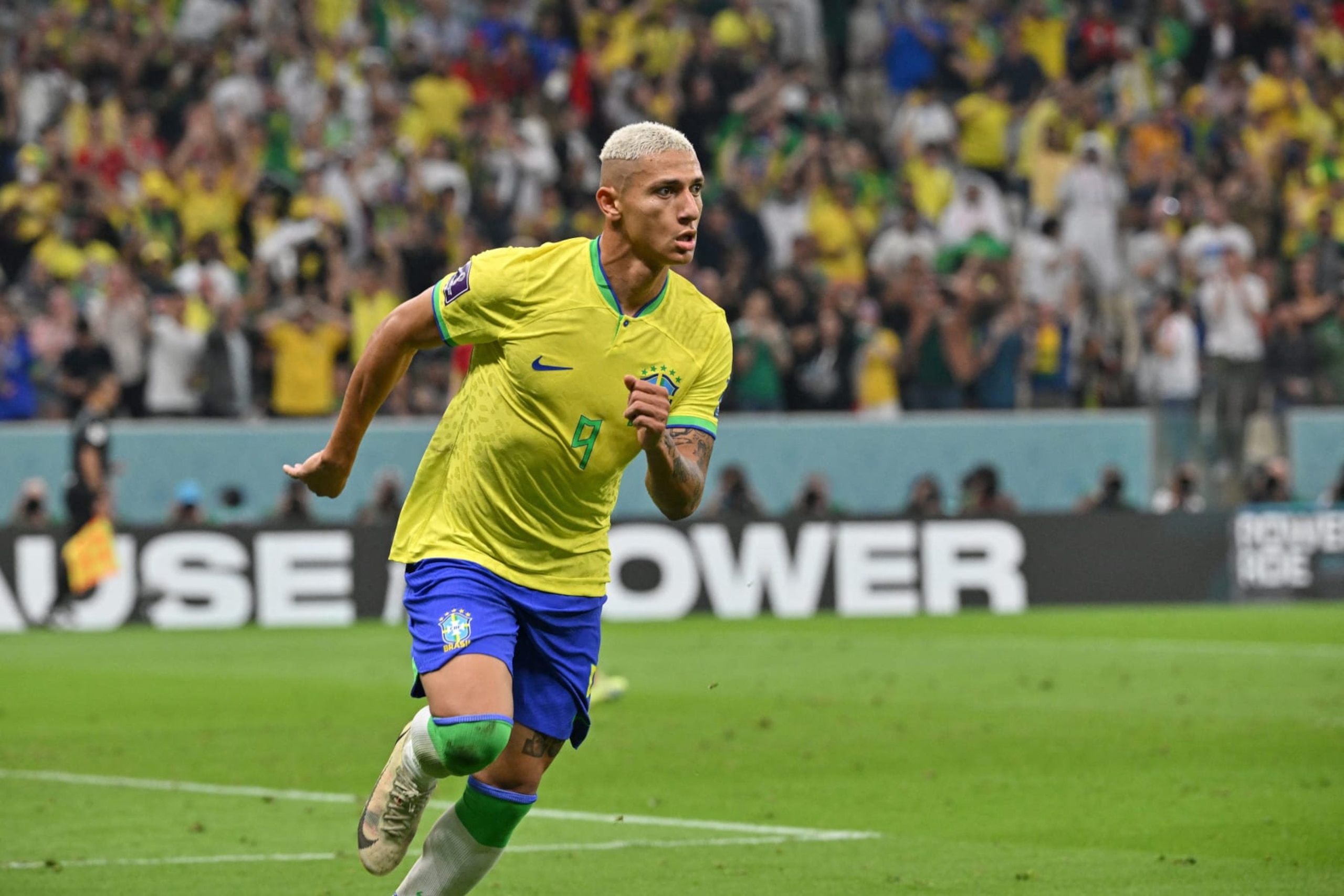 Brazil's forward #09 Richarlison celebrates scoring his team's second goal during the Qatar 2022 World Cup Group G football match between Brazil and Serbia at the Lusail Stadium in Lusail, north of Doha on November 24, 2022. (Photo by NELSON ALMEIDA / AFP) (Photo by NELSON ALMEIDA/AFP via Getty Images)
