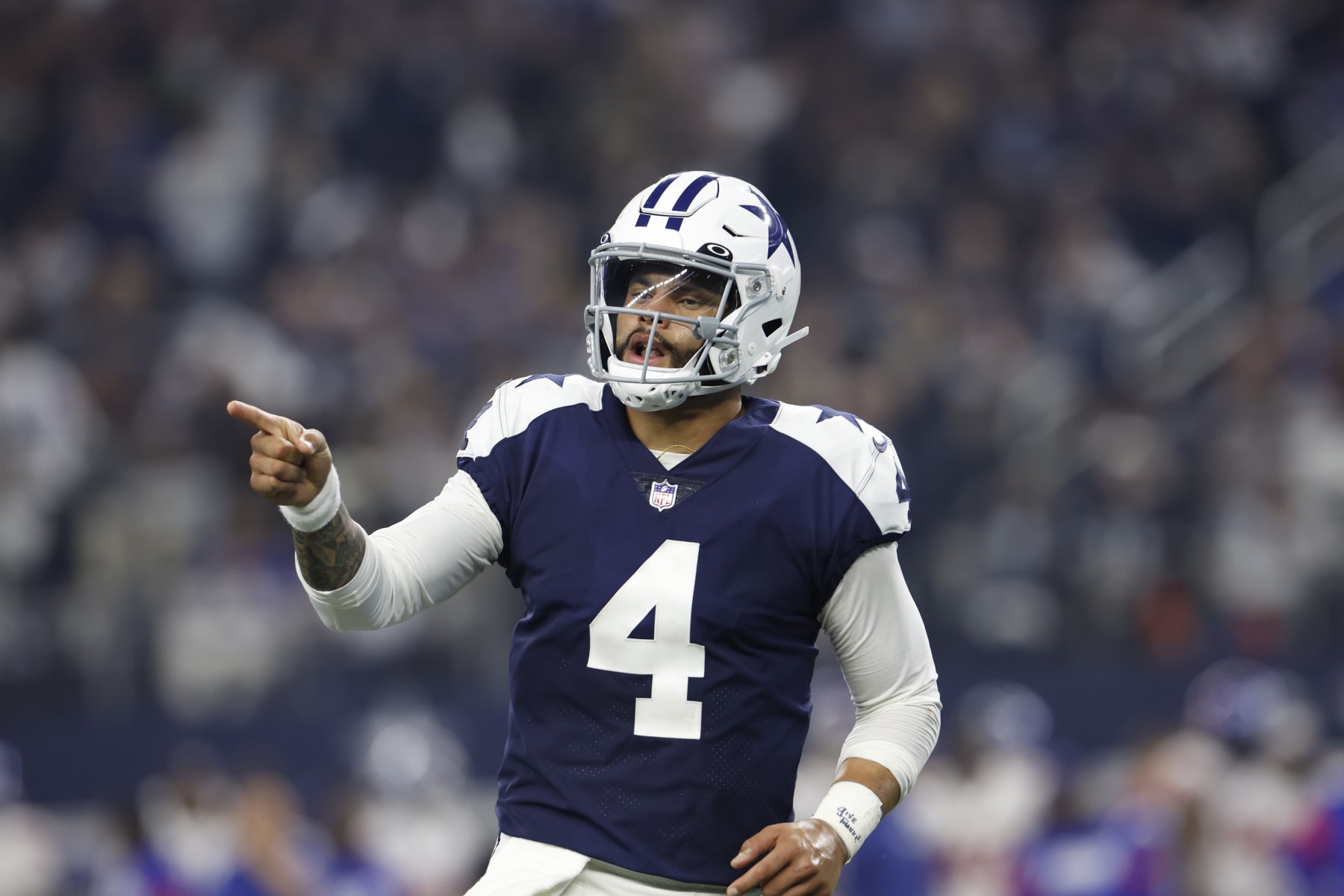 Dallas Cowboys quarterback Dak Prescott (4) celebrates during an NFL game against the New York Giants on Thursday, November 24, 2022, in Arlington, Texas. (AP Photo/Matt Patterson) Dallas Cowboys quarterback Dak Prescott (4) celebrates during an NFL game against the New York Giants on Thursday, November 24, 2022, in Arlington, Texas. (AP Photo/Matt Patterson)