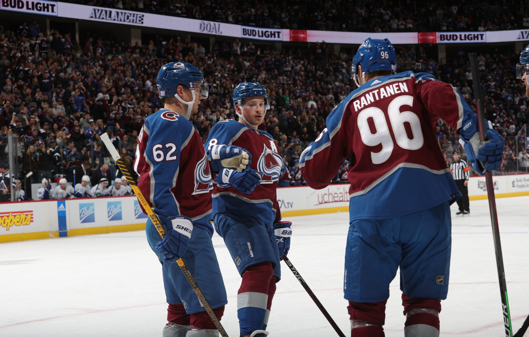 DENVER, COLORADO - NOVEMBER 23: Mikko Rantanen #96, Artturi Lehkonen #62 and Cale Makar #8 of the Colorado Avalanche celebrate a goal  against the Vancouver Canucks at Ball Arena on November 23, 2022 in Denver, Colorado. (Photo by Michael Martin/NHLI via Getty Images)