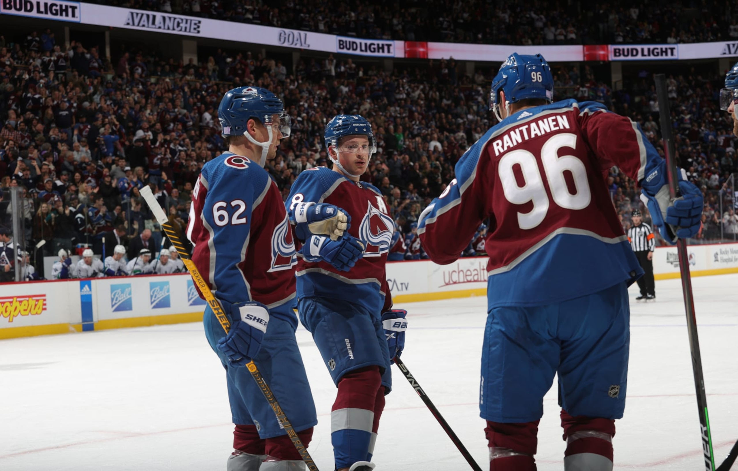 DENVER, COLORADO - NOVEMBER 23: Mikko Rantanen #96, Artturi Lehkonen #62 and Cale Makar #8 of the Colorado Avalanche celebrate a goal  against the Vancouver Canucks at Ball Arena on November 23, 2022 in Denver, Colorado. (Photo by Michael Martin/NHLI via Getty Images)