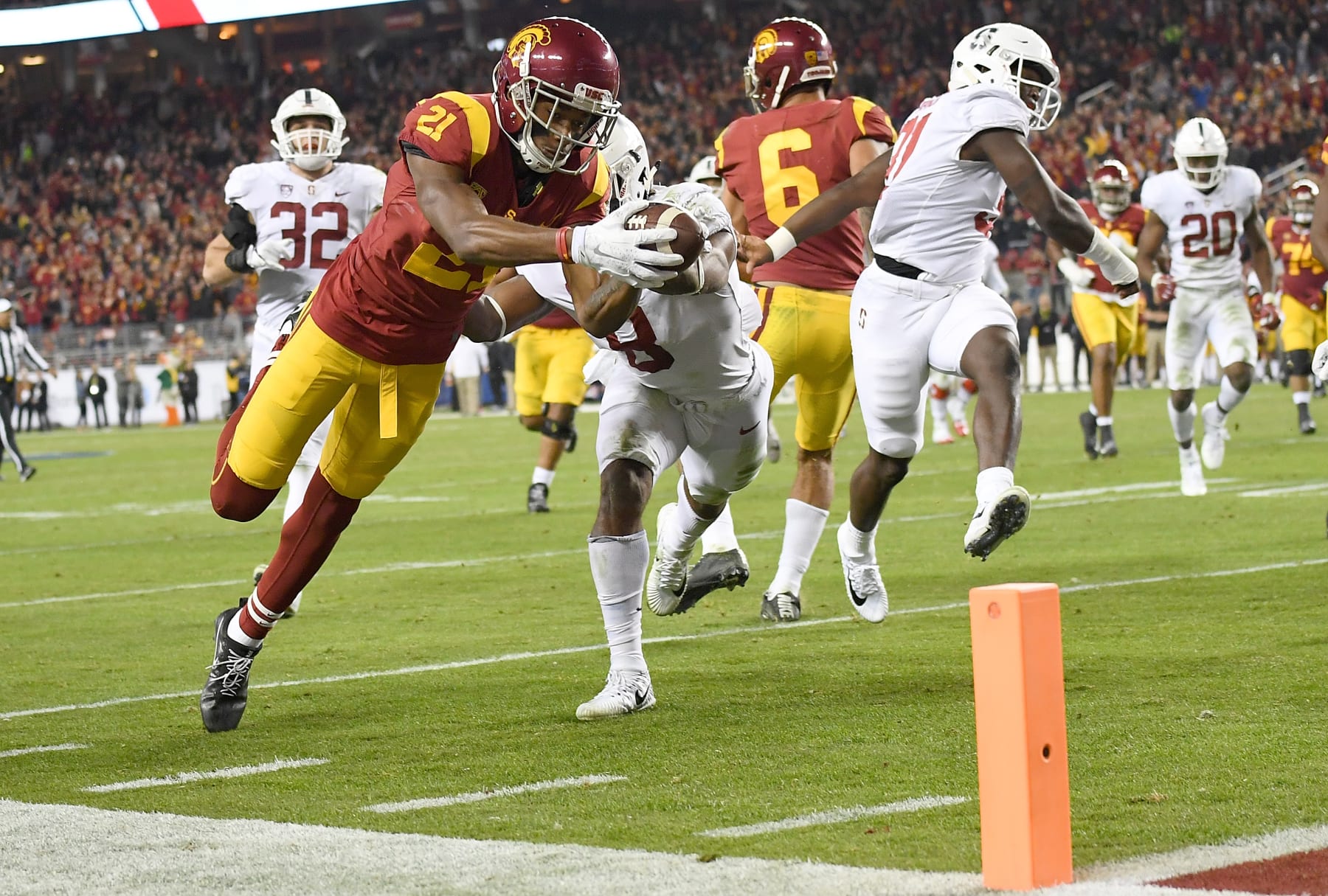 SANTA CLARA, CA - DECEMBER 01:  Tyler Vaughns #21 of the USC Trojans dives into the endzone for a touchdown against the Stanford Cardinal during the Pac-12 Football Championship Game at Levi's Stadium on December 1, 2017 in Santa Clara, California.  (Photo by Thearon W. Henderson/Getty Images)