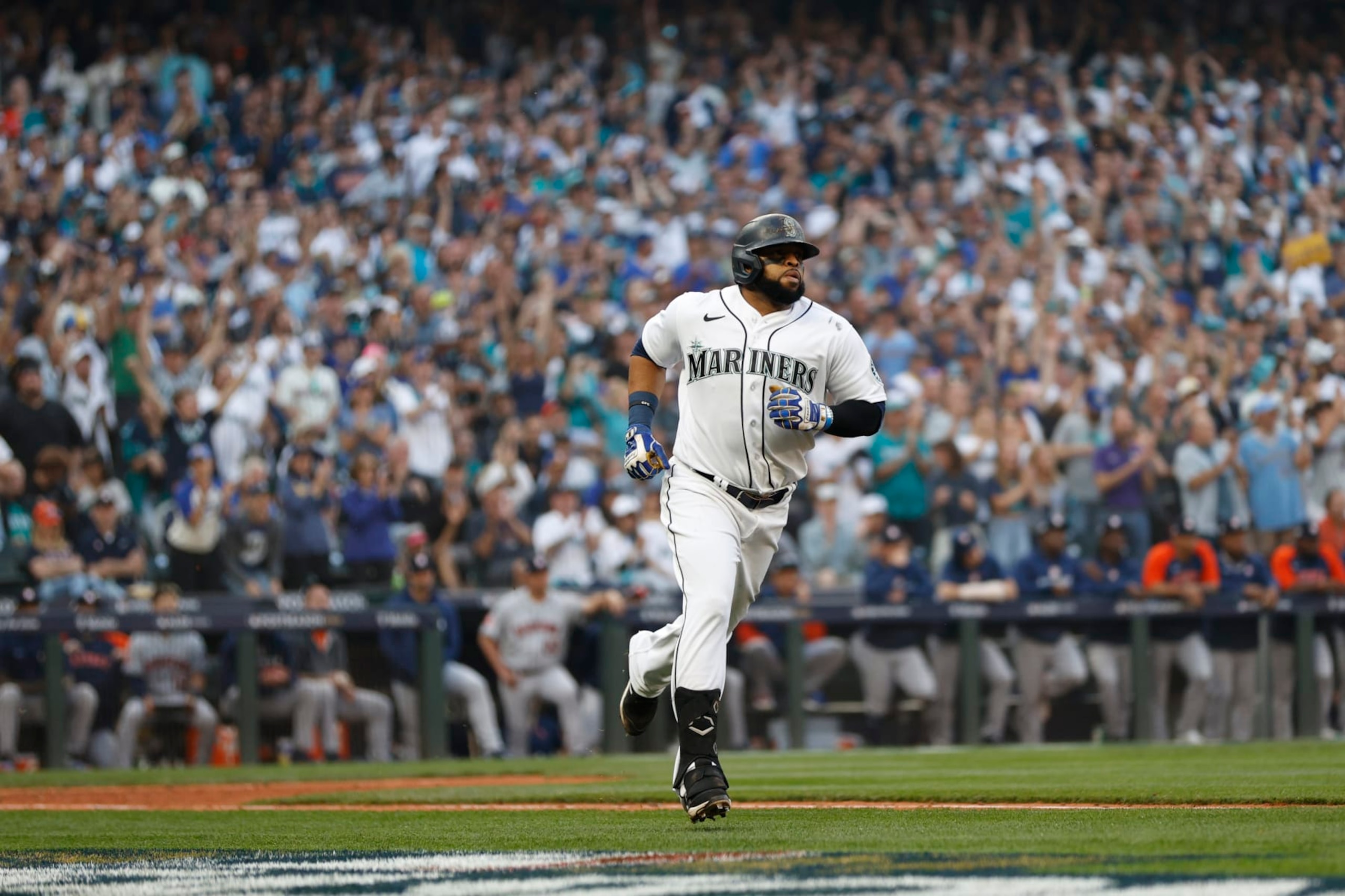 SEATTLE, WASHINGTON - OCTOBER 15: Carlos Santana #41 of the Seattle Mariners single during the twelfth inning against the Houston Astros in game three of the American League Division Series at T-Mobile Park on October 15, 2022 in Seattle, Washington. (Photo by Steph Chambers/Getty Images) SEATTLE, WASHINGTON - OCTOBER 15: Carlos Santana #41 of the Seattle Mariners single during the twelfth inning against the Houston Astros in game three of the American League Division Series at T-Mobile Park on October 15, 2022 in Seattle, Washington. (Photo by Steph Chambers/Getty Images)
