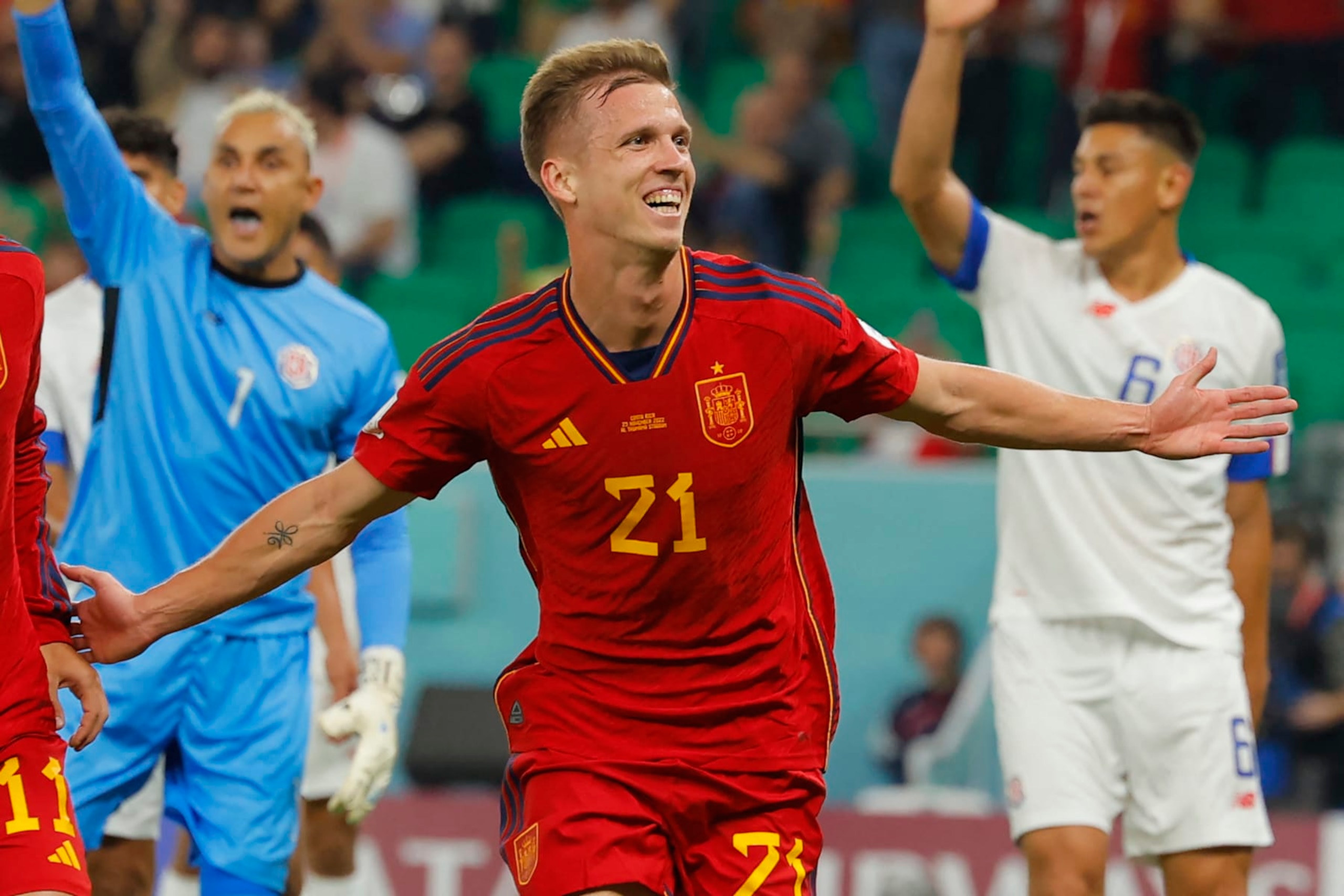 Spain's forward #21 Dani Olmo celebrates scoring the opening goal during the Qatar 2022 World Cup Group E football match between Spain and Costa Rica at the Al-Thumama Stadium in Doha on November 23, 2022. (Photo by Odd ANDERSEN / AFP) (Photo by ODD ANDERSEN/AFP via Getty Images) Spain's forward #21 Dani Olmo celebrates scoring the opening goal during the Qatar 2022 World Cup Group E football match between Spain and Costa Rica at the Al-Thumama Stadium in Doha on November 23, 2022. (Photo by Odd ANDERSEN / AFP) (Photo by ODD ANDERSEN/AFP via Getty Images)