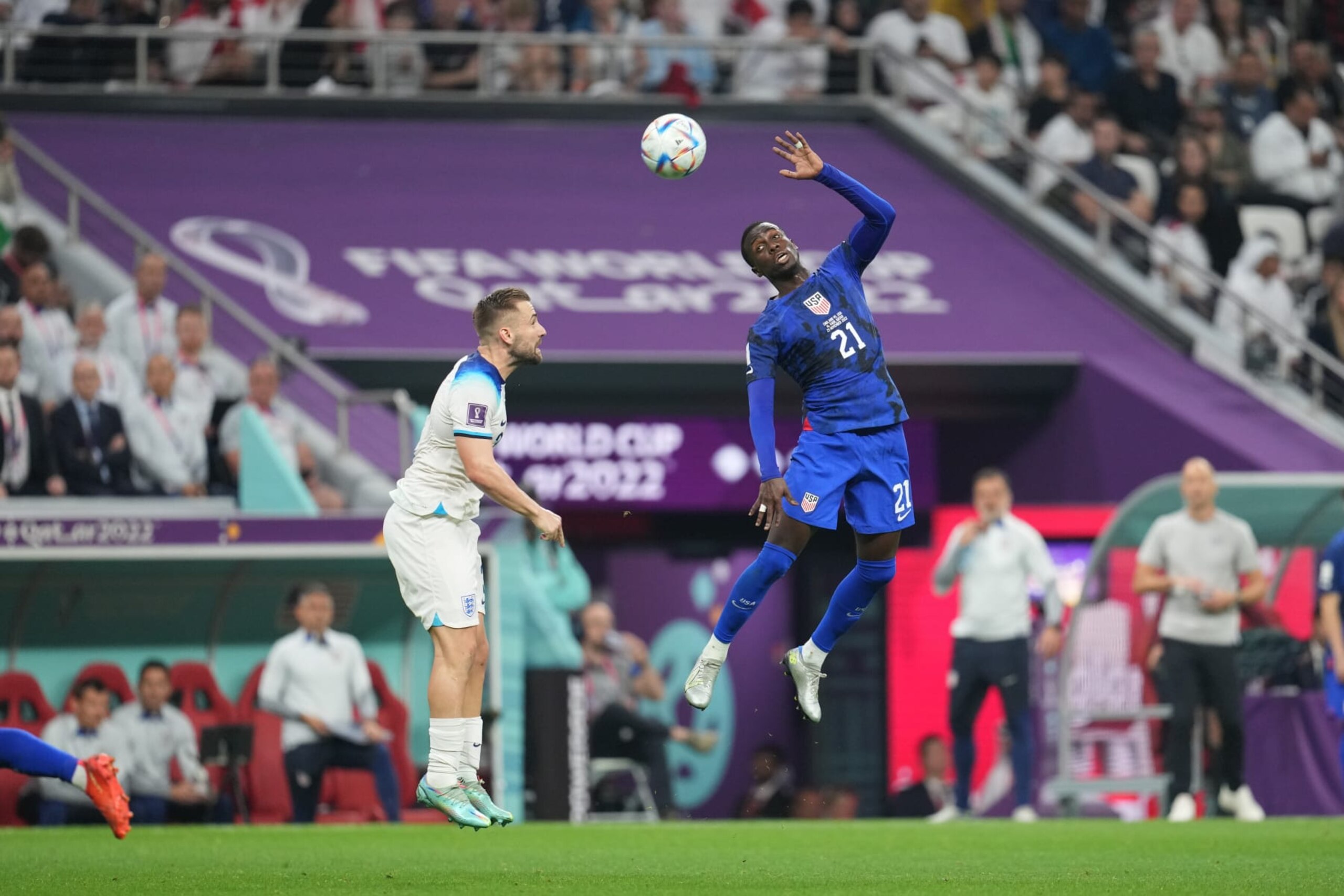 AL KHOR, QATAR - NOVEMBER 25: Tim Weah #21 of the United States goes up for a header during a FIFA World Cup Qatar 2022 Group B match between England and USMNT at Al Bayt Stadium on November 25, 2022 in Al Khor, Qatar. (Photo by Brad Smith/ISI Photos/Getty Images) AL KHOR, QATAR - NOVEMBER 25: Tim Weah #21 of the United States goes up for a header during a FIFA World Cup Qatar 2022 Group B match between England and USMNT at Al Bayt Stadium on November 25, 2022 in Al Khor, Qatar. (Photo by Brad Smith/ISI Photos/Getty Images)
