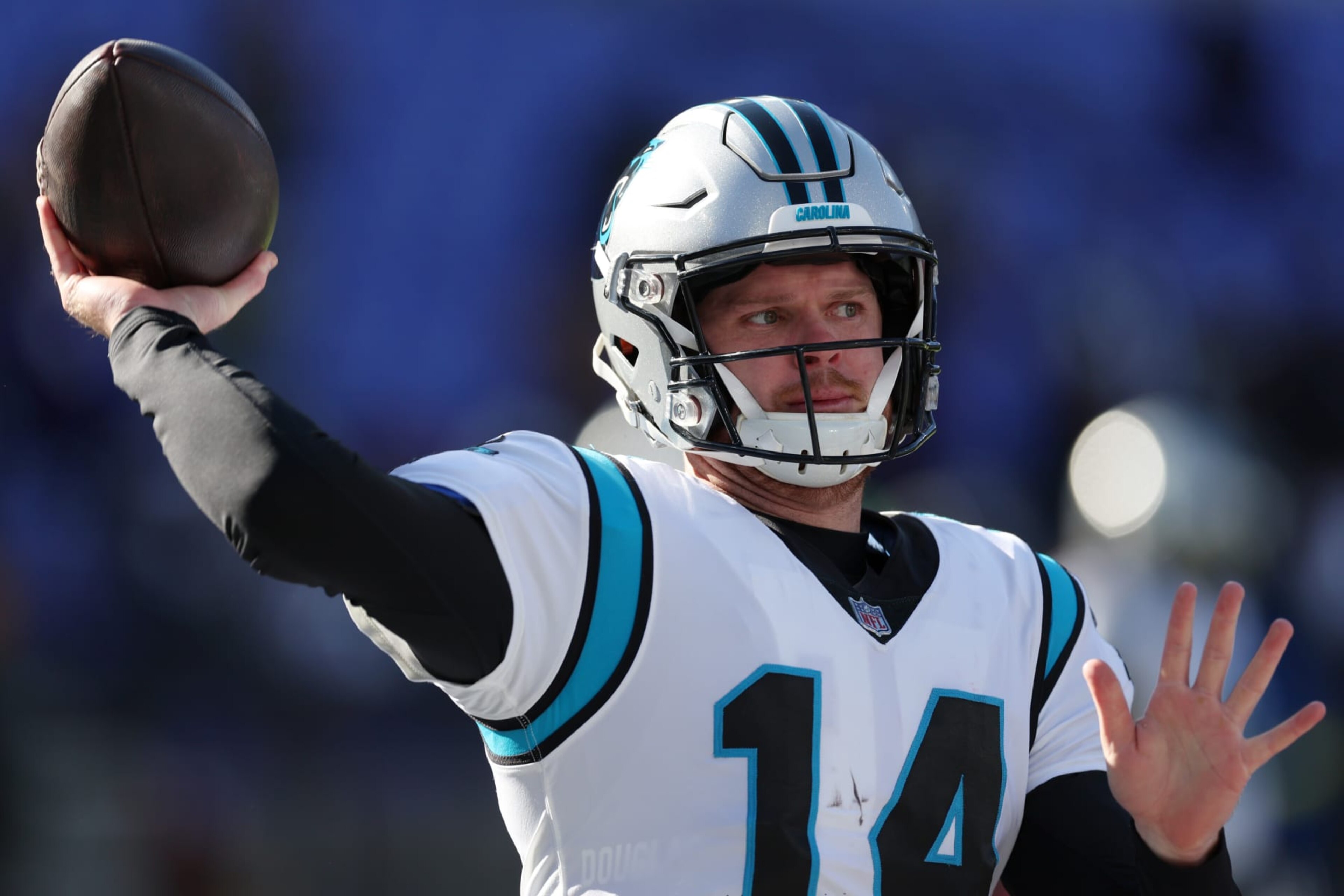 BALTIMORE, MARYLAND - NOVEMBER 20: Sam Darnold #14 of the Carolina Panthers warms up before a game against the Baltimore Ravens at M&T Bank Stadium on November 20, 2022 in Baltimore, Maryland. (Photo by Rob Carr/Getty Images) BALTIMORE, MARYLAND - NOVEMBER 20: Sam Darnold #14 of the Carolina Panthers warms up before a game against the Baltimore Ravens at M&T Bank Stadium on November 20, 2022 in Baltimore, Maryland. (Photo by Rob Carr/Getty Images)