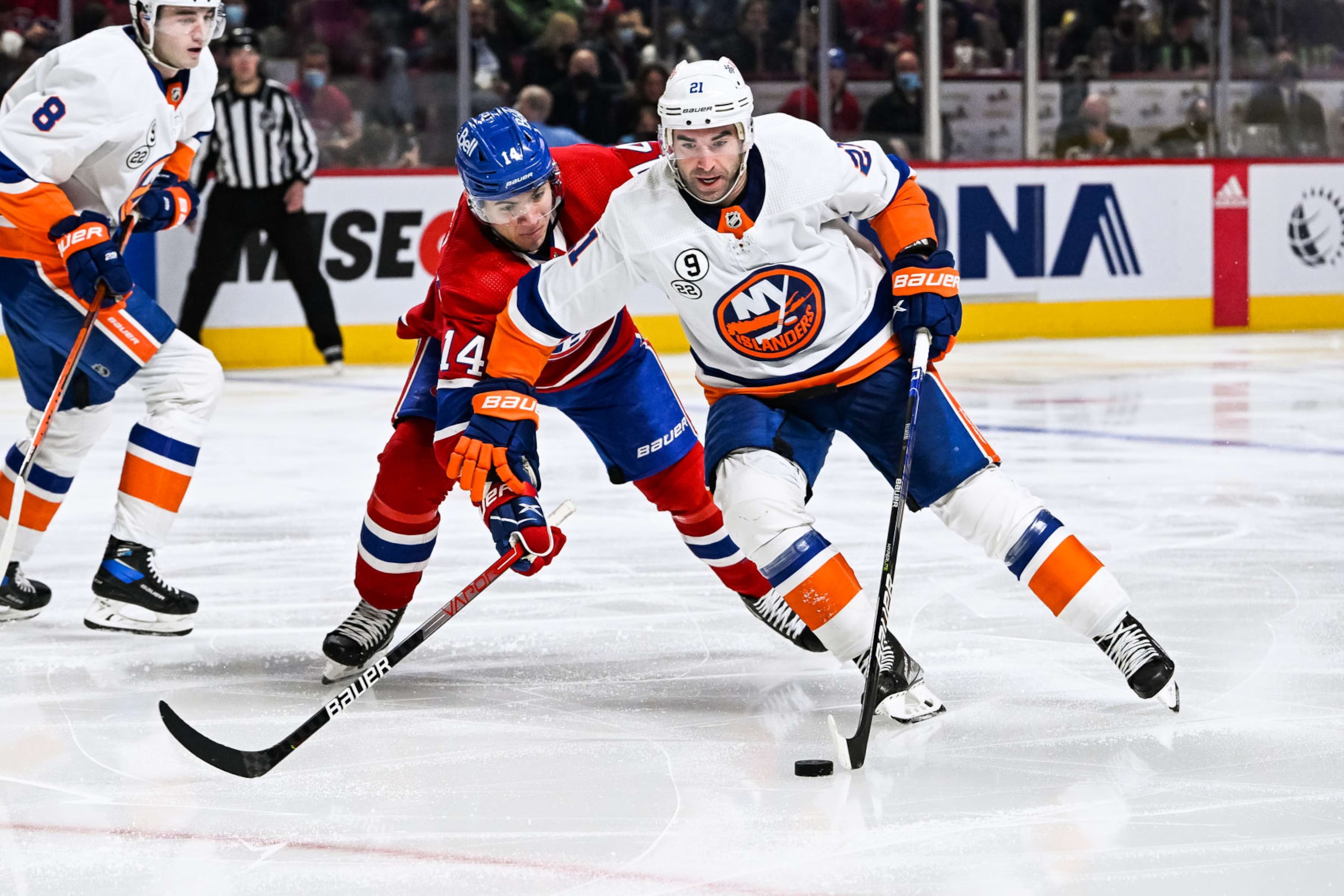Montreal Canadiens center Nick Suzuki (left) and New York Islanders winger Kyle Palmieri. Montreal Canadiens center Nick Suzuki (left) and New York Islanders winger Kyle Palmieri.