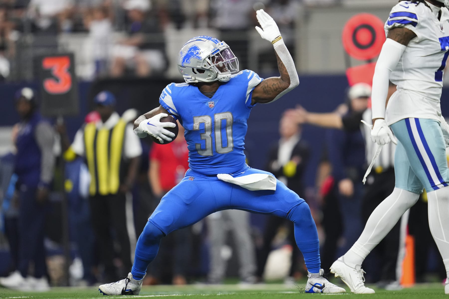ARLINGTON, TX - OCTOBER 23: Jamaal Williams #30 of the Detroit Lions celebraes against the Dallas Cowboys at AT&T Stadium on October 23, 2022 in Arlington, Texas. (Photo by Cooper Neill/Getty Images)