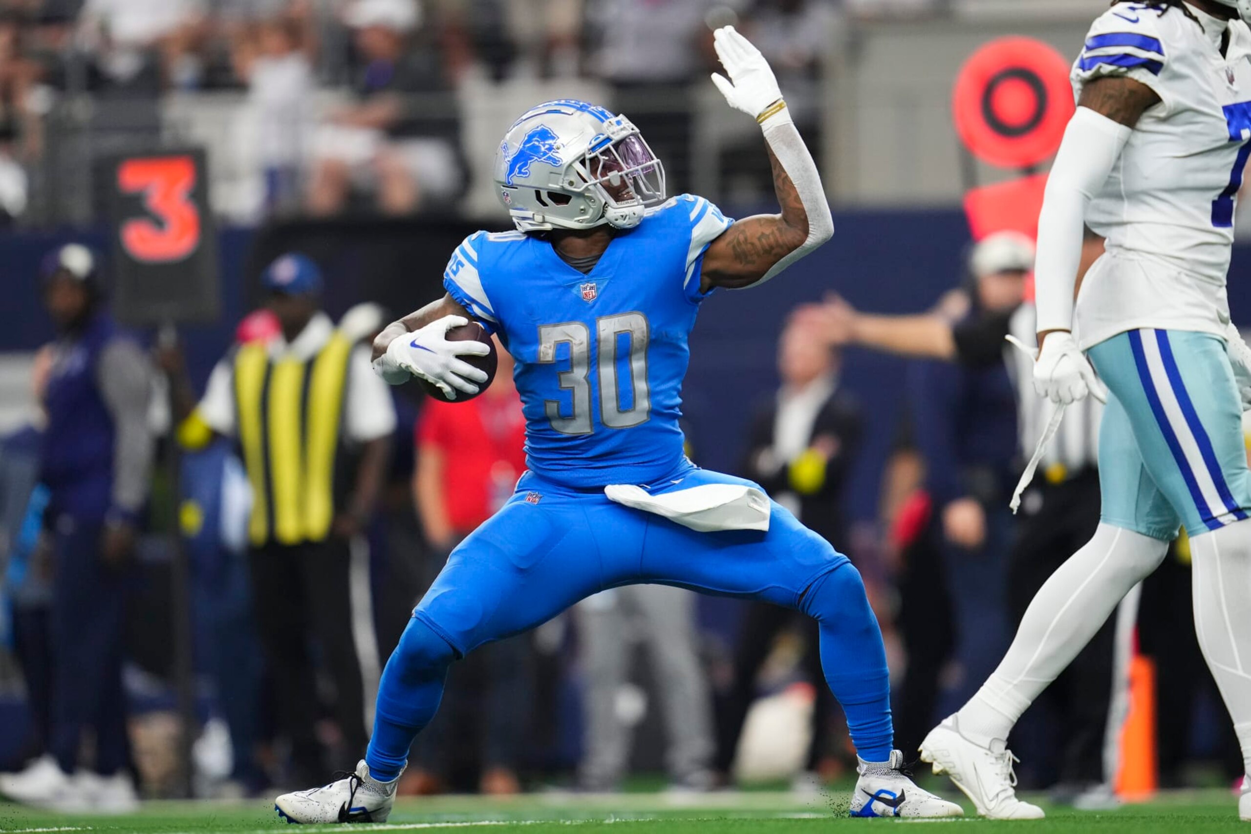 ARLINGTON, TX - OCTOBER 23: Jamaal Williams #30 of the Detroit Lions celebraes against the Dallas Cowboys at AT&T Stadium on October 23, 2022 in Arlington, Texas. (Photo by Cooper Neill/Getty Images) ARLINGTON, TX - OCTOBER 23: Jamaal Williams #30 of the Detroit Lions celebraes against the Dallas Cowboys at AT&T Stadium on October 23, 2022 in Arlington, Texas. (Photo by Cooper Neill/Getty Images)