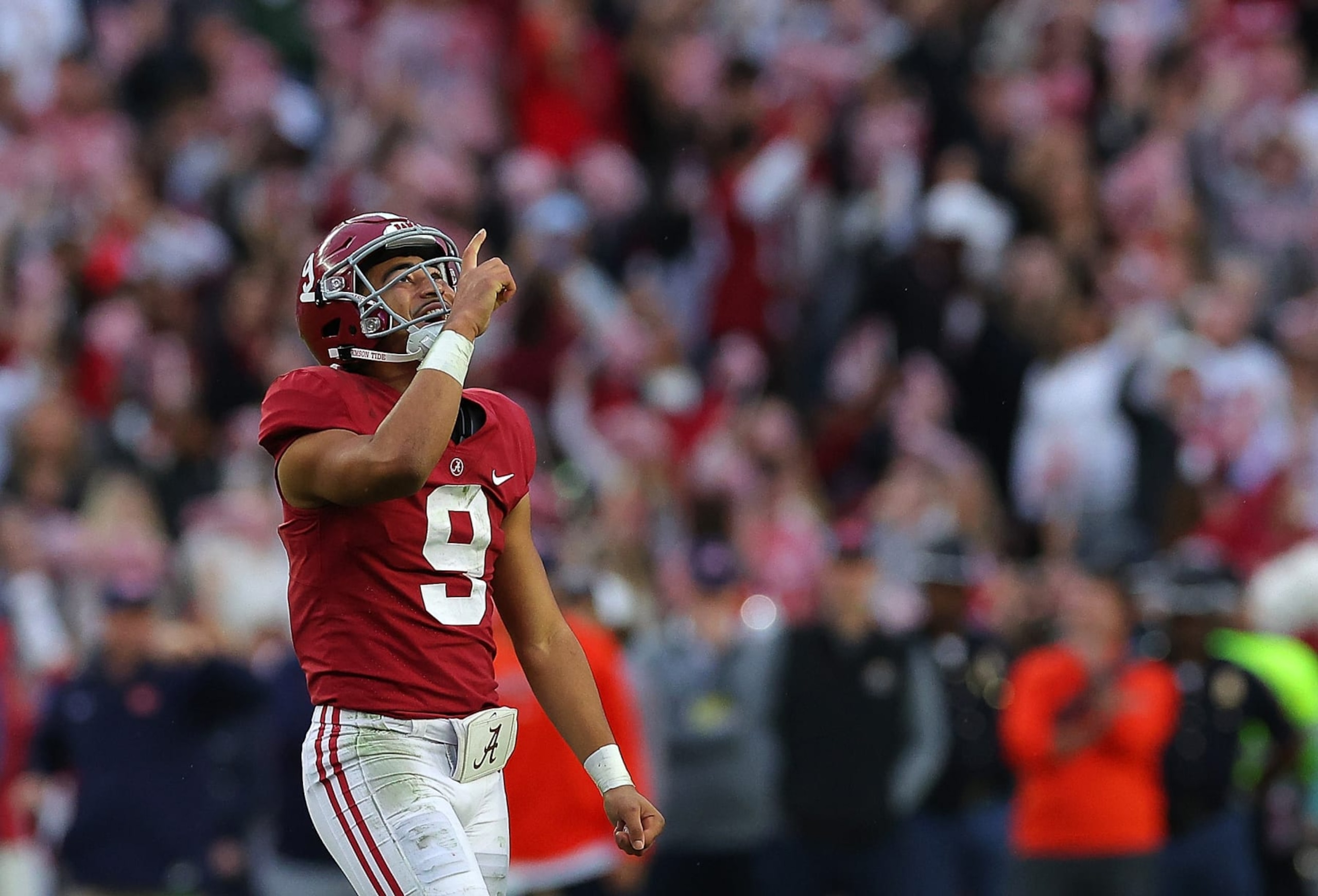TUSCALOOSA, ALABAMA - NOVEMBER 26: Bryce Young #9 of the Alabama Crimson Tide reacts after passing for a touchdown to Traeshon Holden #11 against the Auburn Tigers during the first half at Bryant-Denny Stadium on November 26, 2022 in Tuscaloosa, Alabama. (Photo by Kevin C. Cox/Getty Images) TUSCALOOSA, ALABAMA - NOVEMBER 26: Bryce Young #9 of the Alabama Crimson Tide reacts after passing for a touchdown to Traeshon Holden #11 against the Auburn Tigers during the first half at Bryant-Denny Stadium on November 26, 2022 in Tuscaloosa, Alabama. (Photo by Kevin C. Cox/Getty Images)