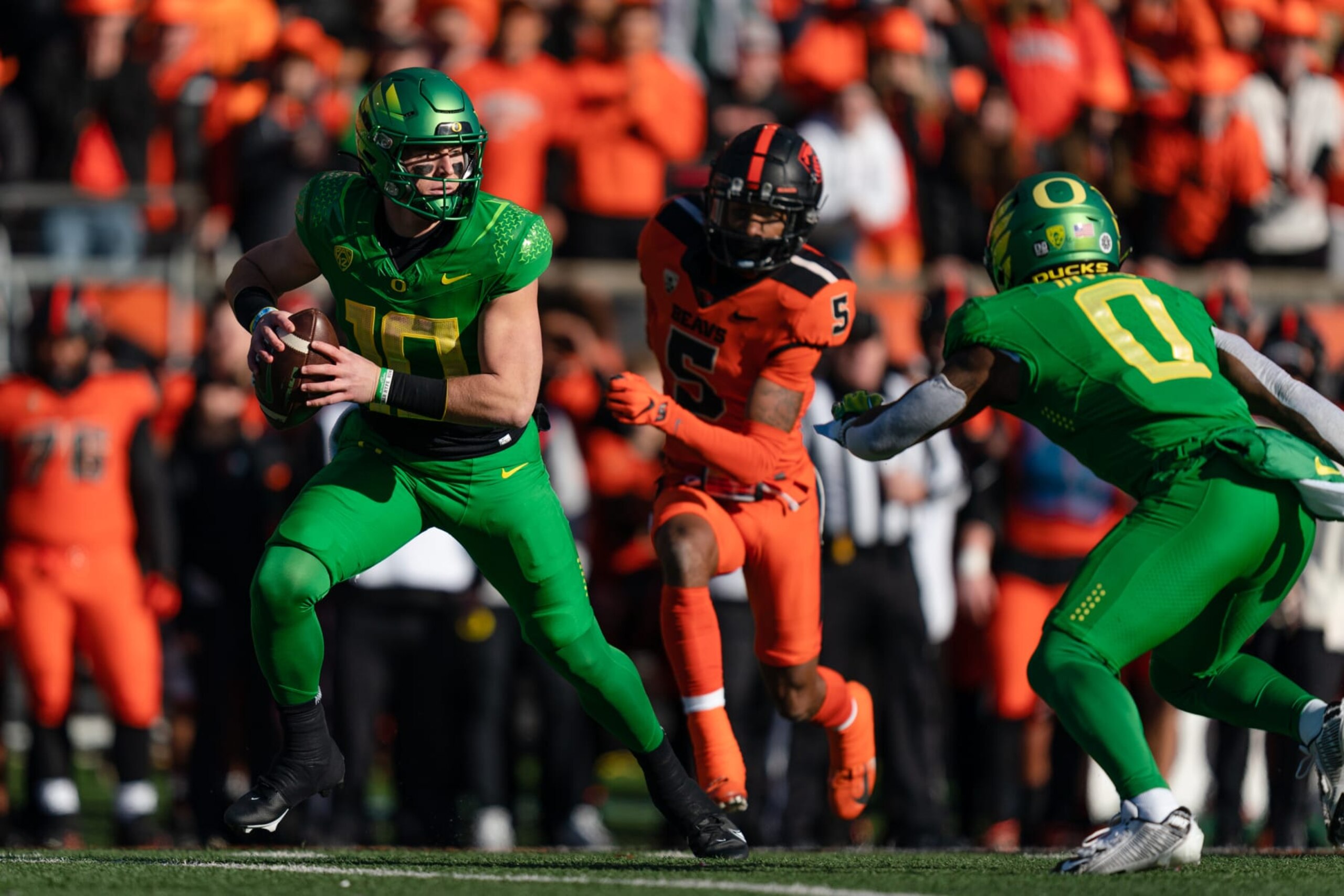 CORVALLIS, OR - NOVEMBER 26: Quarterback Bo Nix #10 of the Oregon Ducks looks to pass the ball during the first half of the game against the Oregon State Beavers at Reser Stadium on November 26, 2022 in Corvallis, Oregon. (Photo by Ali Gradischer/Getty Images) CORVALLIS, OR - NOVEMBER 26: Quarterback Bo Nix #10 of the Oregon Ducks looks to pass the ball during the first half of the game against the Oregon State Beavers at Reser Stadium on November 26, 2022 in Corvallis, Oregon. (Photo by Ali Gradischer/Getty Images)