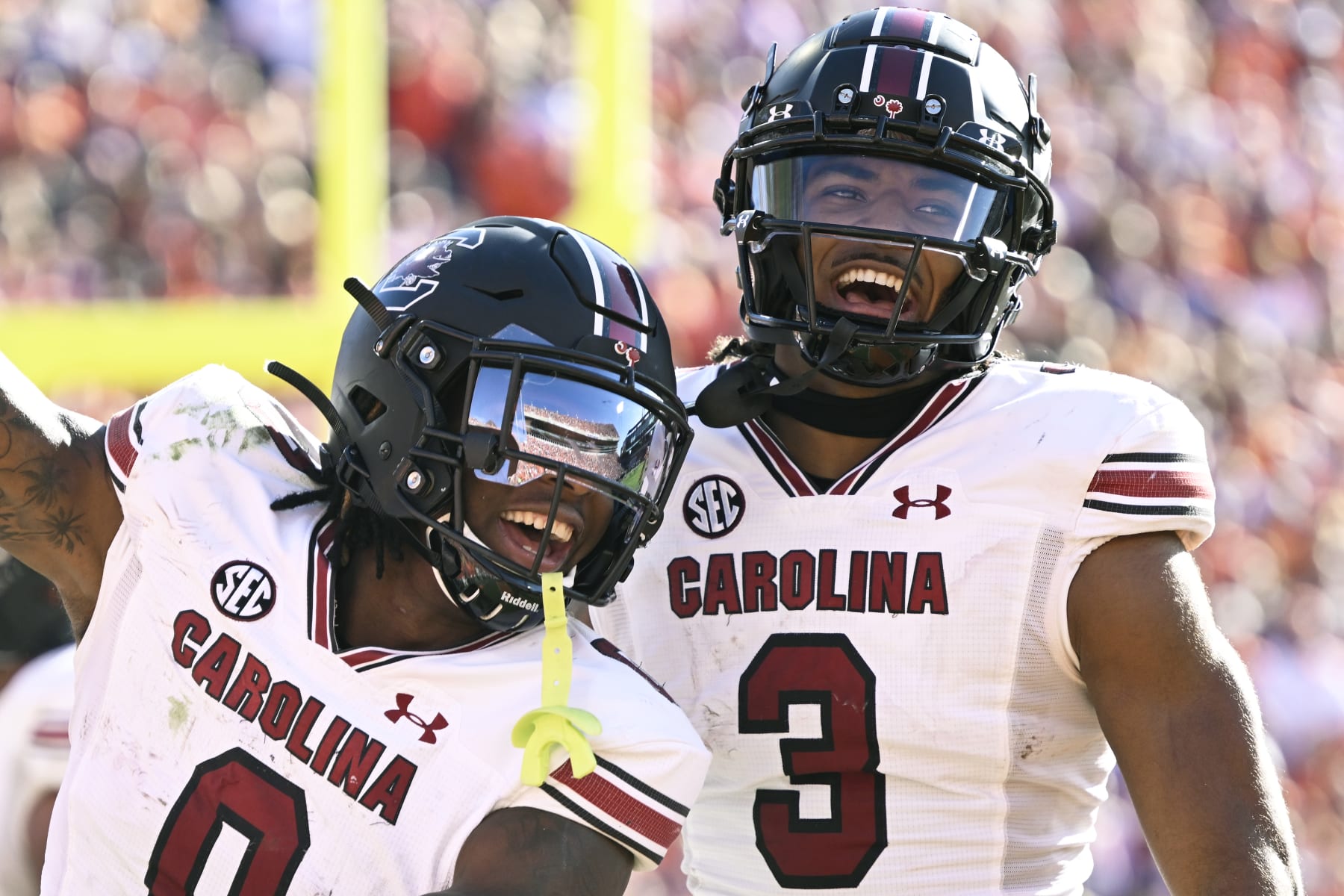 CLEMSON, SOUTH CAROLINA - NOVEMBER 26: Jaheim Bell #0 and Antwane Wells Jr. #3 of the South Carolina Gamecocks celebrate Bell's third quarter touchdown against the Clemson Tigers at Memorial Stadium on November 26, 2022 in Clemson, South Carolina. (Photo by Eakin Howard/Getty Images)