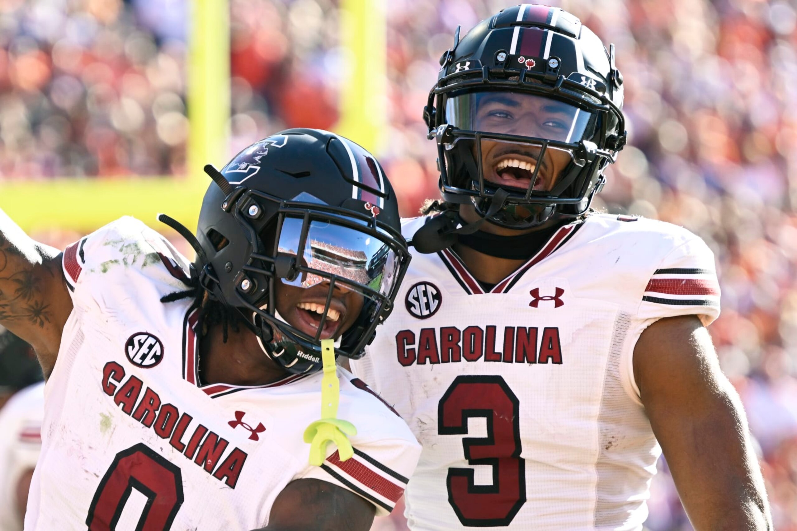 CLEMSON, SOUTH CAROLINA - NOVEMBER 26: Jaheim Bell #0 and Antwane Wells Jr. #3 of the South Carolina Gamecocks celebrate Bell's third quarter touchdown against the Clemson Tigers at Memorial Stadium on November 26, 2022 in Clemson, South Carolina. (Photo by Eakin Howard/Getty Images)