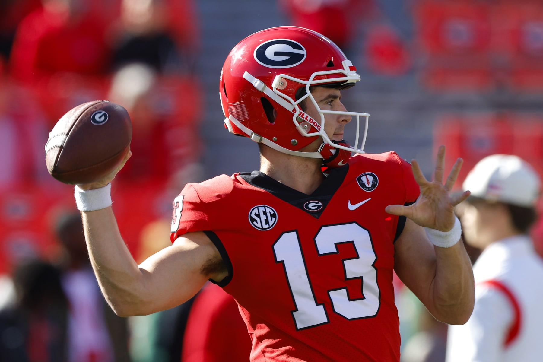 ATHENS, GA - NOVEMBER 26: Stetson Bennett #13 of the Georgia Bulldogs warms up prior to the game against the Georgia Tech Yellow Jackets at Sanford Stadium on November 26, 2022 in Athens, Georgia. (Photo by Todd Kirkland/Getty Images)