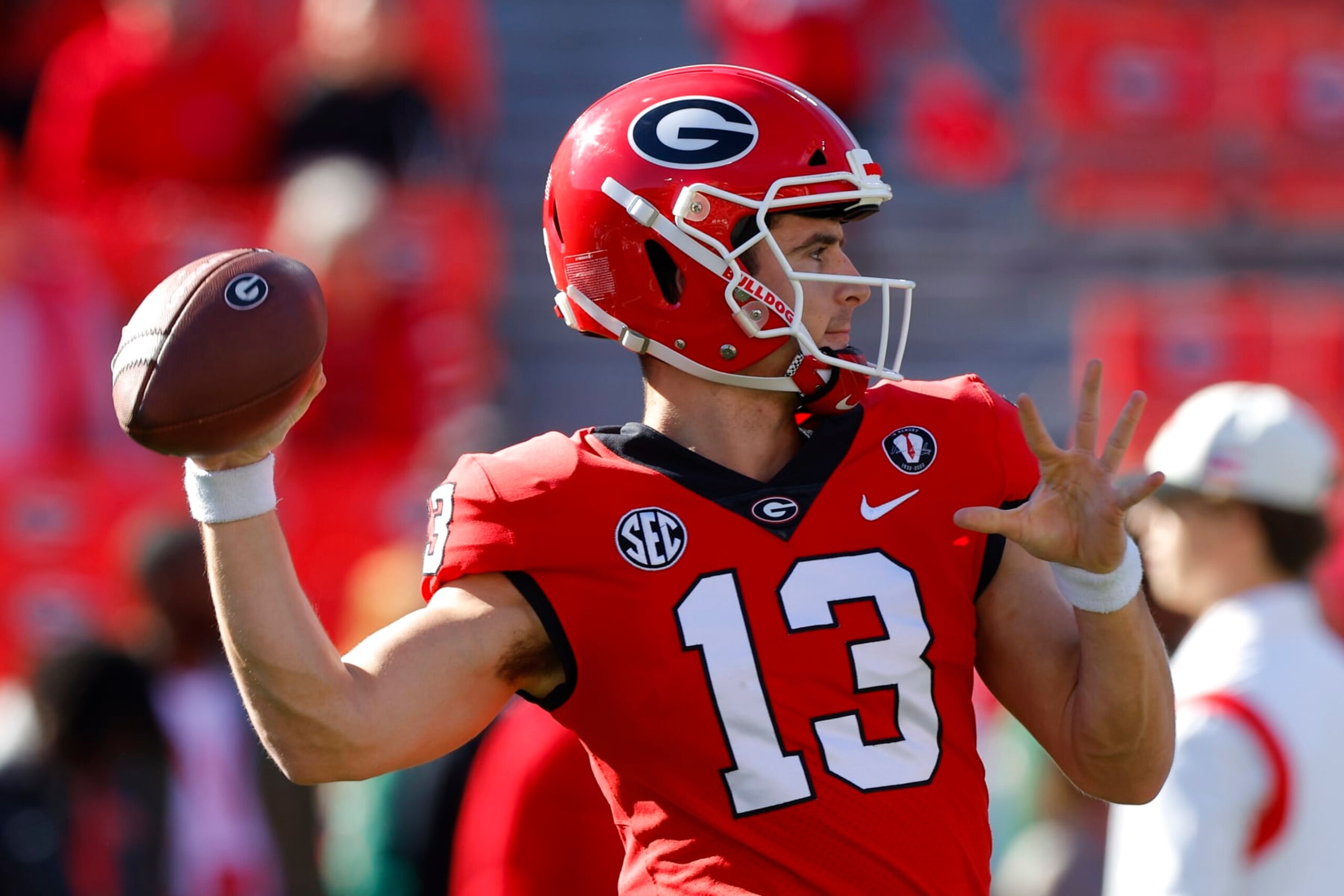 ATHENS, GA - NOVEMBER 26: Stetson Bennett #13 of the Georgia Bulldogs warms up prior to the game against the Georgia Tech Yellow Jackets at Sanford Stadium on November 26, 2022 in Athens, Georgia. (Photo by Todd Kirkland/Getty Images)