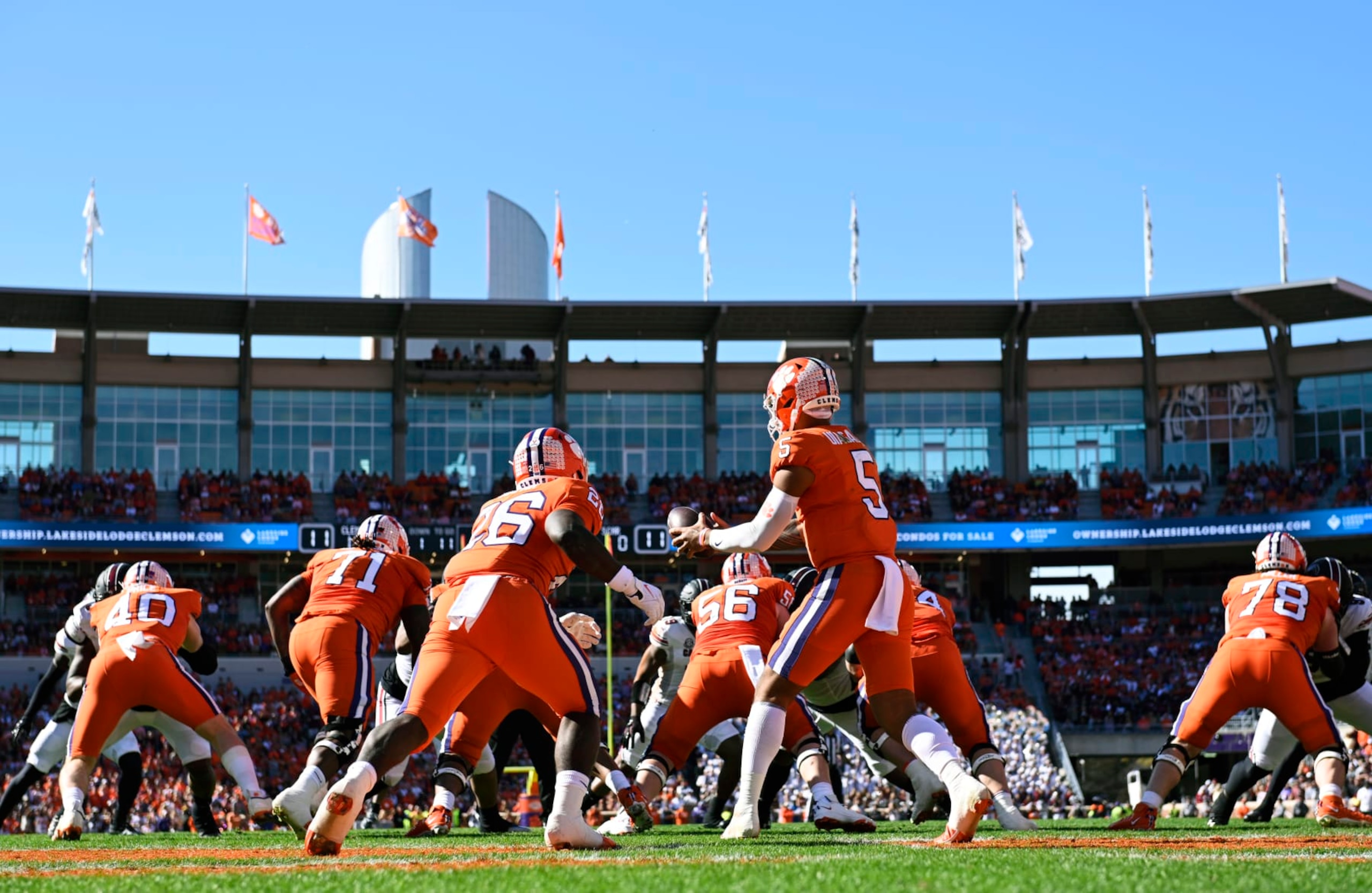 CLEMSON, SOUTH CAROLINA - NOVEMBER 26: DJ Uiagalelei #5 hands the ball to Phil Mafah #26 of the Clemson Tigers in the first quarter against the South Carolina Gamecocks at Memorial Stadium on November 26, 2022 in Clemson, South Carolina. (Photo by Eakin Howard/Getty Images)