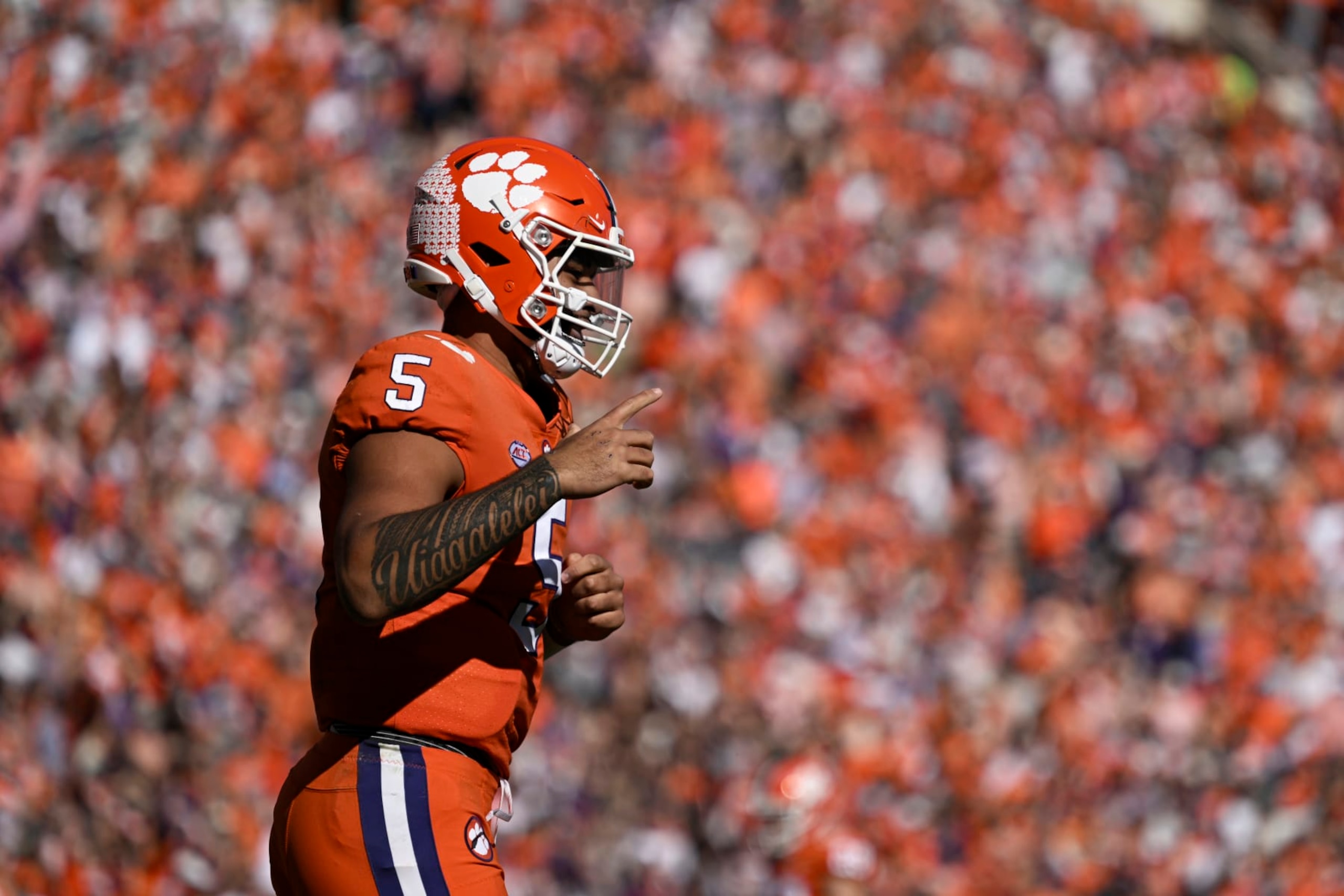 CLEMSON, SOUTH CAROLINA - NOVEMBER 26: DJ Uiagalelei #5 of the Clemson Tigers celebrates his first quarter touchdown against the South Carolina Gamecocks at Memorial Stadium on November 26, 2022 in Clemson, South Carolina. (Photo by Eakin Howard/Getty Images)