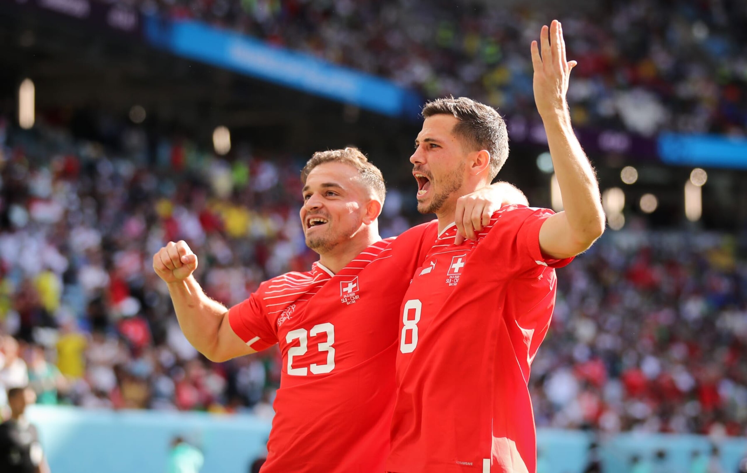 AL WAKRAH, QATAR - NOVEMBER 24: Xherdan Shaqiri of Switzerland and Remo Freuler of Switzerland celebrates the goal of Breel Embolo of Switzerland during the FIFA World Cup Qatar 2022 Group G match between Switzerland and Cameroon at Al Janoub Stadium on November 24, 2022 in Al Wakrah, Qatar. (Photo by Stefan Matzke - sampics/Corbis via Getty Images) AL WAKRAH, QATAR - NOVEMBER 24: Xherdan Shaqiri of Switzerland and Remo Freuler of Switzerland celebrates the goal of Breel Embolo of Switzerland during the FIFA World Cup Qatar 2022 Group G match between Switzerland and Cameroon at Al Janoub Stadium on November 24, 2022 in Al Wakrah, Qatar. (Photo by Stefan Matzke - sampics/Corbis via Getty Images)