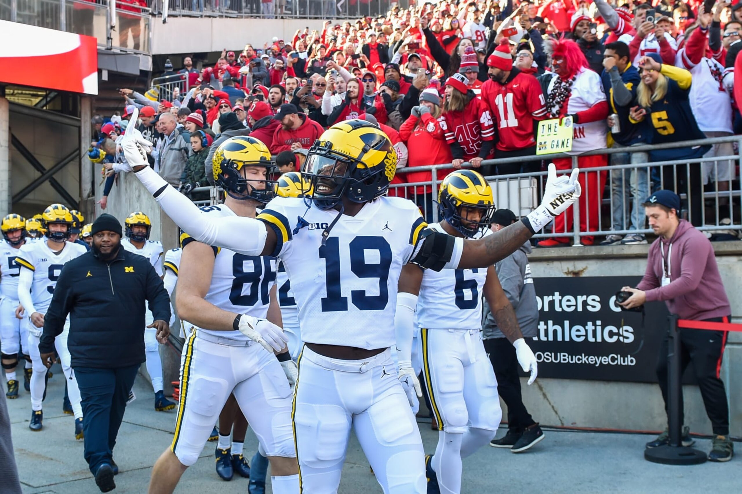 COLUMBUS, OHIO - NOVEMBER 26: Rod Moore #19 of the Michigan Wolverines walks onto the field with his team before a college football game against the Ohio State Buckeyes at Ohio Stadium on November 26, 2022 in Columbus, Ohio. (Photo by Aaron J. Thornton/Getty Images)