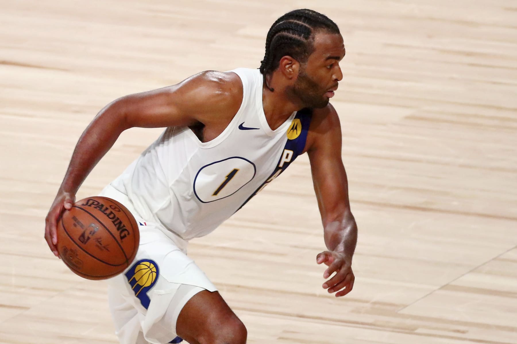 Indiana Pacers forward T.J. Warren (1) dribbles against the Miami Heat during the second half of Game 3 of an NBA basketball first-round playoff series, Saturday, Aug. 22, 2020, in Lake Buena Vista, Fla. (Kim Klement/Pool Photo via AP)