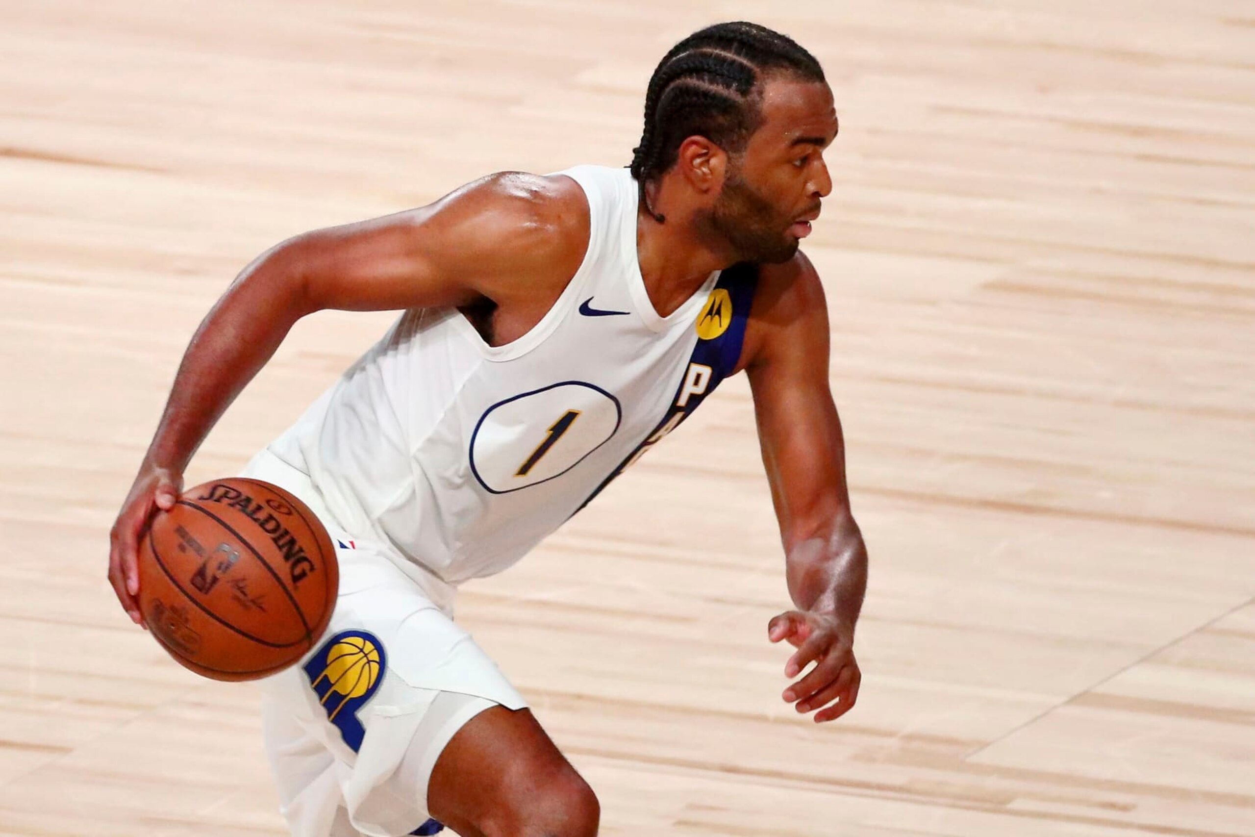 Indiana Pacers forward T.J. Warren (1) dribbles against the Miami Heat during the second half of Game 3 of an NBA basketball first-round playoff series, Saturday, Aug. 22, 2020, in Lake Buena Vista, Fla. (Kim Klement/Pool Photo via AP)
