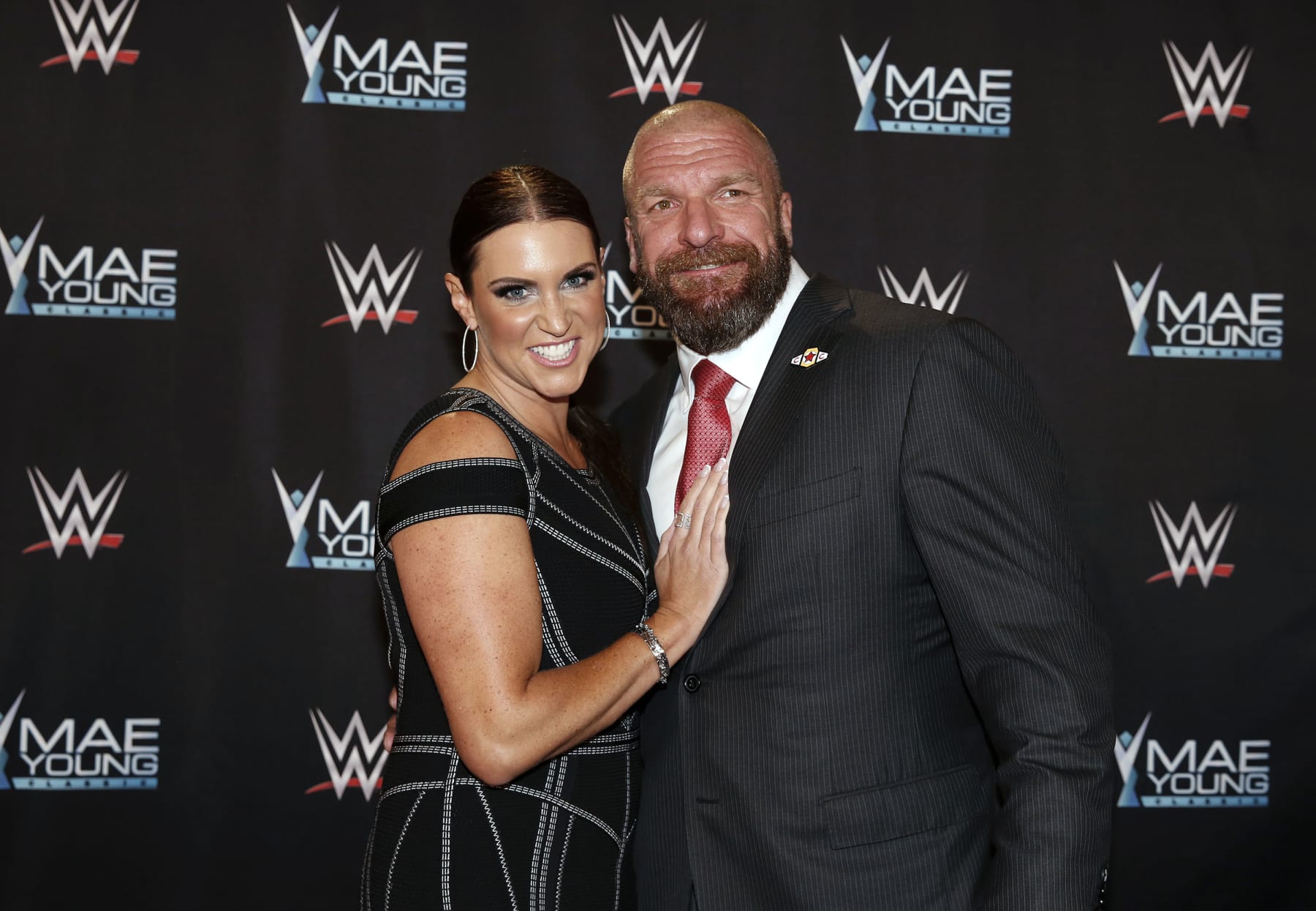 IMAGE DISTRIBUTED FOR WWE - WWE Chief Brand Officer Stephanie McMahon and WWE EVP of Talent, Live Events and Creative Paul "Triple H" Levesque celebrate the Mae Young Classic at the Thomas & Mack Center on Tuesday, Sept. 12, 2017, in Las Vegas. (Bizuayehu Tesfaye/AP Images for WWE)