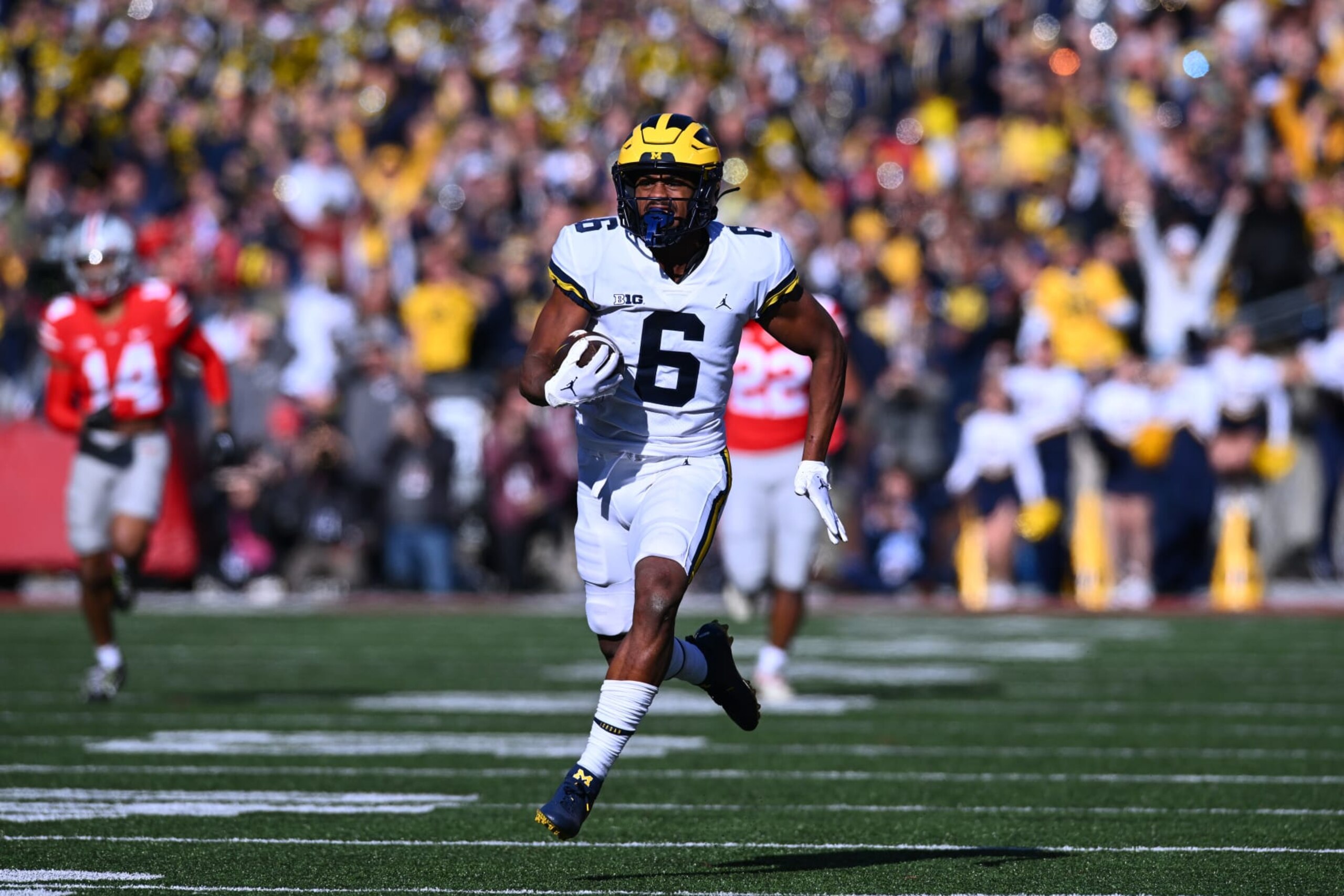 COLUMBUS, OHIO - NOVEMBER 26: Cornelius Johnson #6 of the Michigan Wolverines runs with the ball during the second quarter of a game against the Ohio State Buckeyes at Ohio Stadium on November 26, 2022 in Columbus, Ohio. (Photo by Ben Jackson/Getty Images)