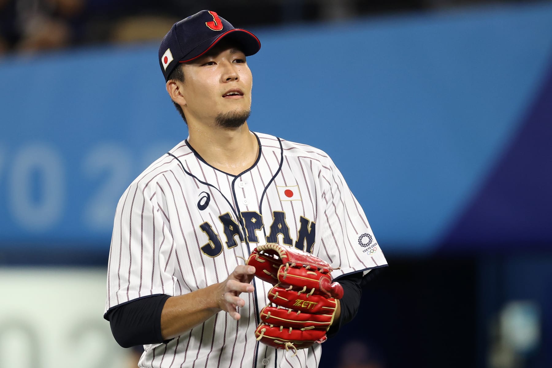 YOKOHAMA, JAPAN - AUGUST 07: Pitcher Kodai Senga #21 of Team Japan is seen after the sixth inning against Team United States during the gold medal game between Team United States and Team Japan on day fifteen of the Tokyo 2020 Olympic Games at Yokohama Baseball Stadium on August 07, 2021 in Yokohama, Kanagawa, Japan. (Photo by Koji Watanabe/Getty Images)