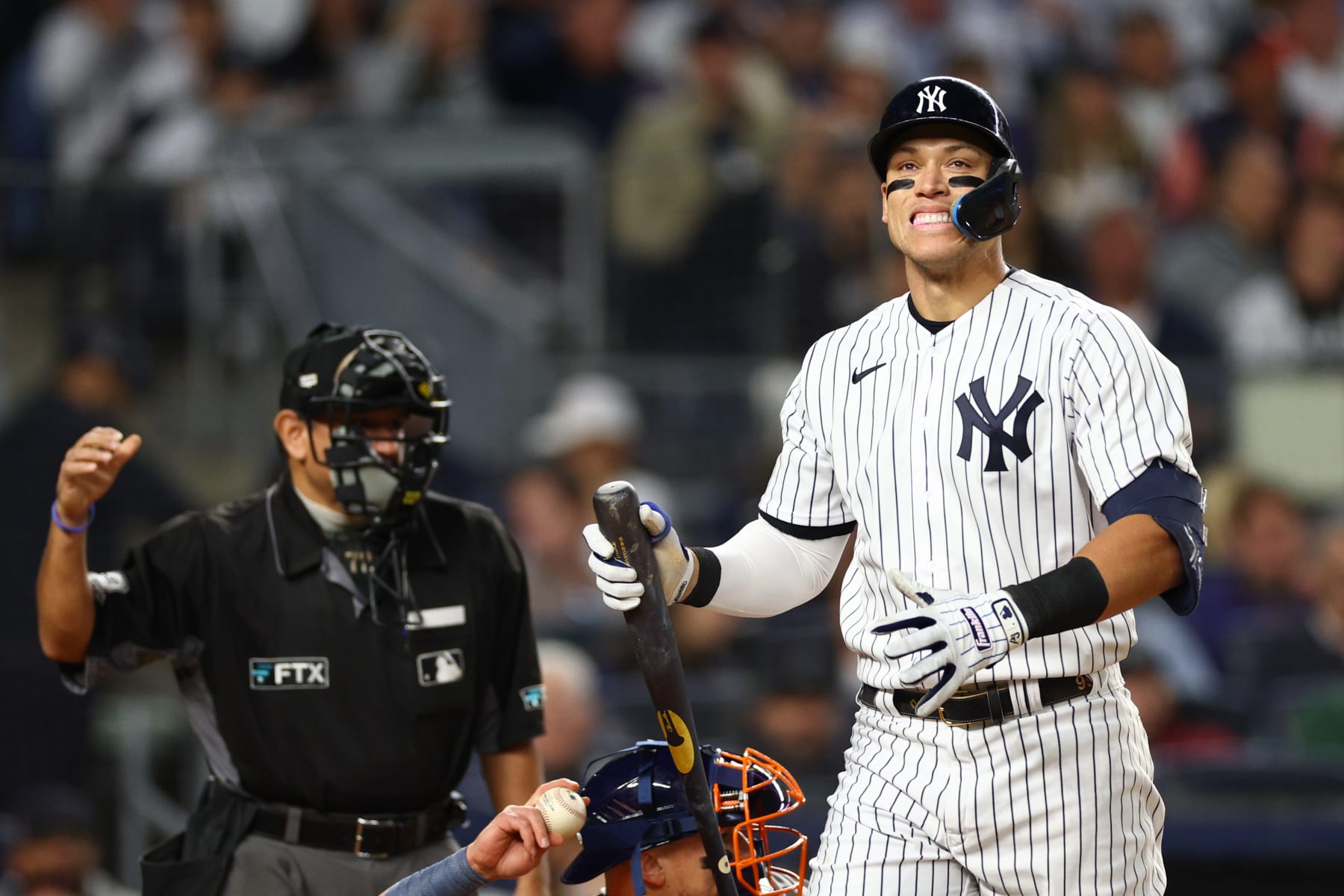 NEW YORK, NEW YORK - OCTOBER 22: Aaron Judge #99 of the New York Yankees reacts after striking out against the Houston Astros during the fourth inning in game three of the American League Championship Series at Yankee Stadium on October 22, 2022 in New York City. (Photo by Elsa/Getty Images)