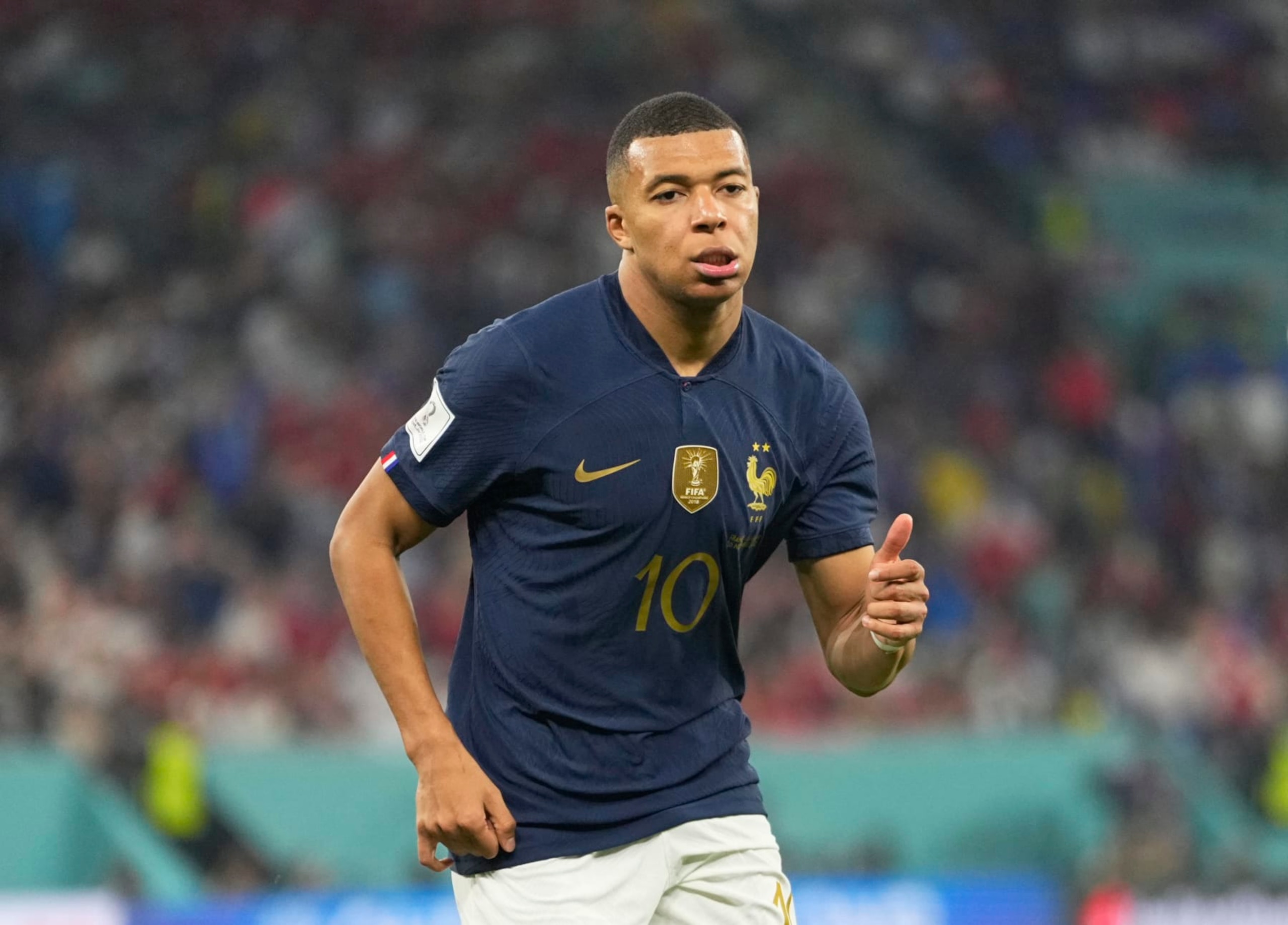DOHA, QATAR - NOVEMBER 26: Kylian Mbappe of France looks on during the FIFA World Cup Qatar 2022 Group D match between France and Denmark at Stadium 974 on November 26, 2022 in Doha, Qatar. (Photo by Ulrik Pedersen/DeFodi Images via Getty Images) DOHA, QATAR - NOVEMBER 26: Kylian Mbappe of France looks on during the FIFA World Cup Qatar 2022 Group D match between France and Denmark at Stadium 974 on November 26, 2022 in Doha, Qatar. (Photo by Ulrik Pedersen/DeFodi Images via Getty Images)
