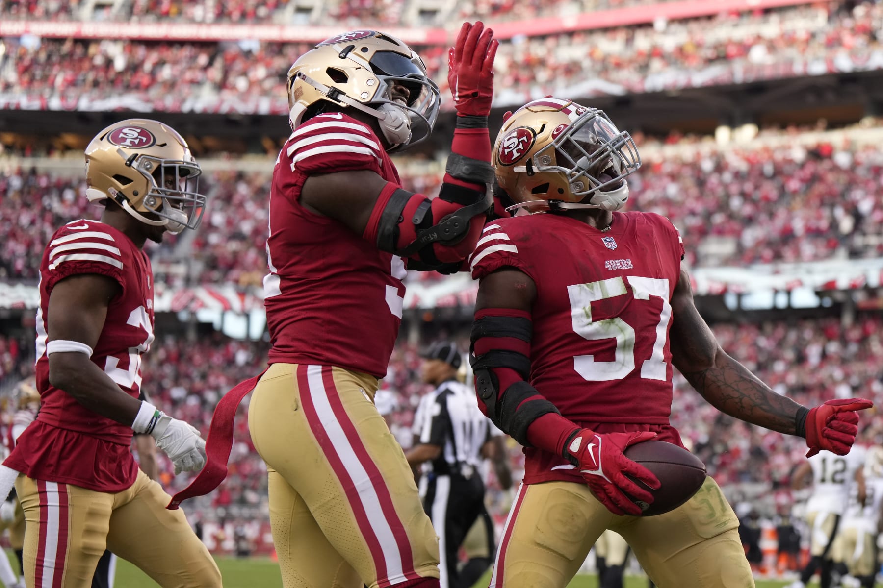 SANTA CLARA, CALIFORNIA - NOVEMBER 27: Dre Greenlaw #57 of the San Francisco 49ers celebrates after recovering a fumble during the fourth quarter in the game against the New Orleans Saints at Levi's Stadium on November 27, 2022 in Santa Clara, California. (Photo by Thearon W. Henderson/Getty Images)