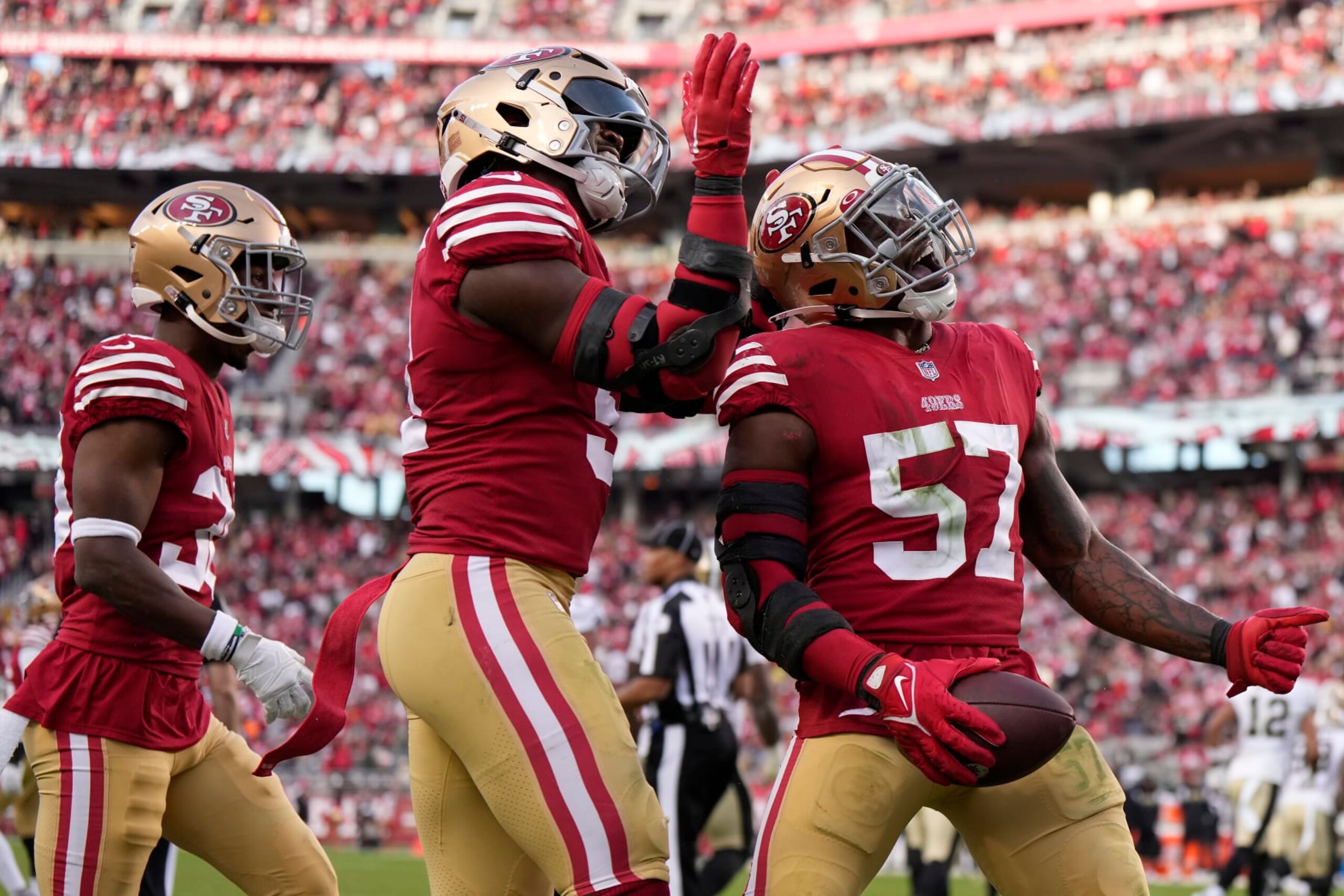 SANTA CLARA, CALIFORNIA - NOVEMBER 27: Dre Greenlaw #57 of the San Francisco 49ers celebrates after recovering a fumble during the fourth quarter in the game against the New Orleans Saints at Levi's Stadium on November 27, 2022 in Santa Clara, California. (Photo by Thearon W. Henderson/Getty Images)