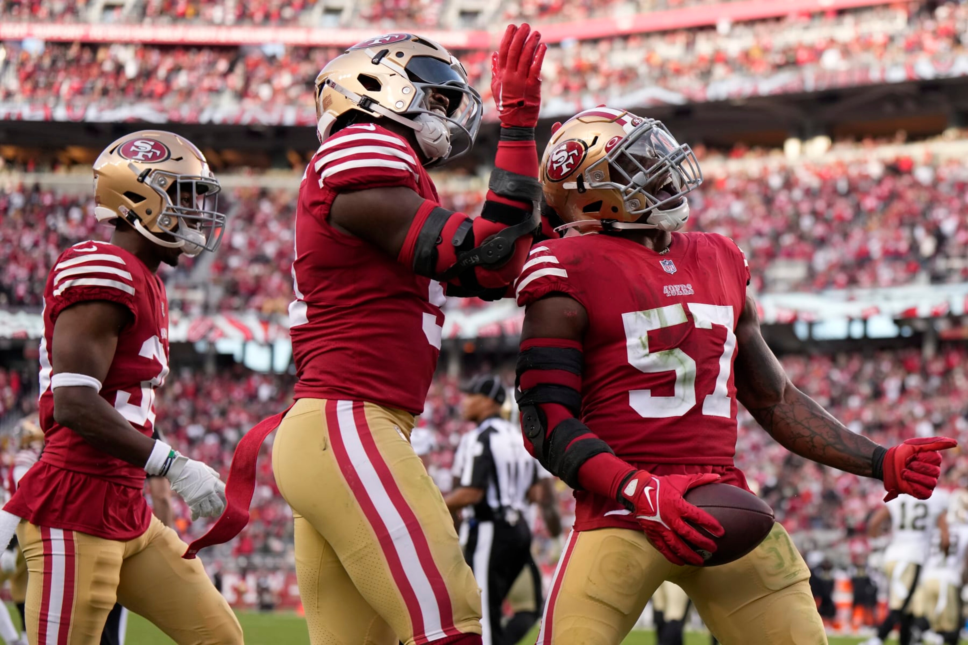 SANTA CLARA, CALIFORNIA - NOVEMBER 27: Dre Greenlaw #57 of the San Francisco 49ers celebrates after recovering a fumble during the fourth quarter in the game against the New Orleans Saints at Levi's Stadium on November 27, 2022 in Santa Clara, California. (Photo by Thearon W. Henderson/Getty Images)