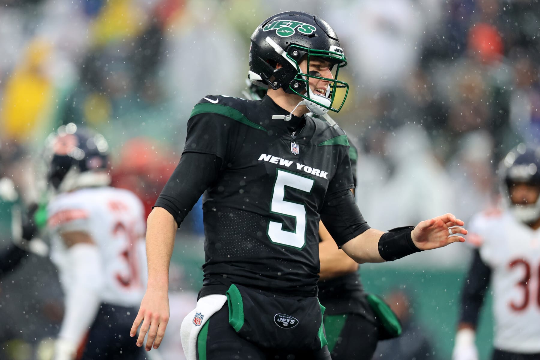 EAST RUTHERFORD, NEW JERSEY - NOVEMBER 27: Mike White #5 of the New York Jets looks on during the second half of a game against the Chicago Bears at MetLife Stadium on November 27, 2022 in East Rutherford, New Jersey. (Photo by Mike Stobe/Getty Images)