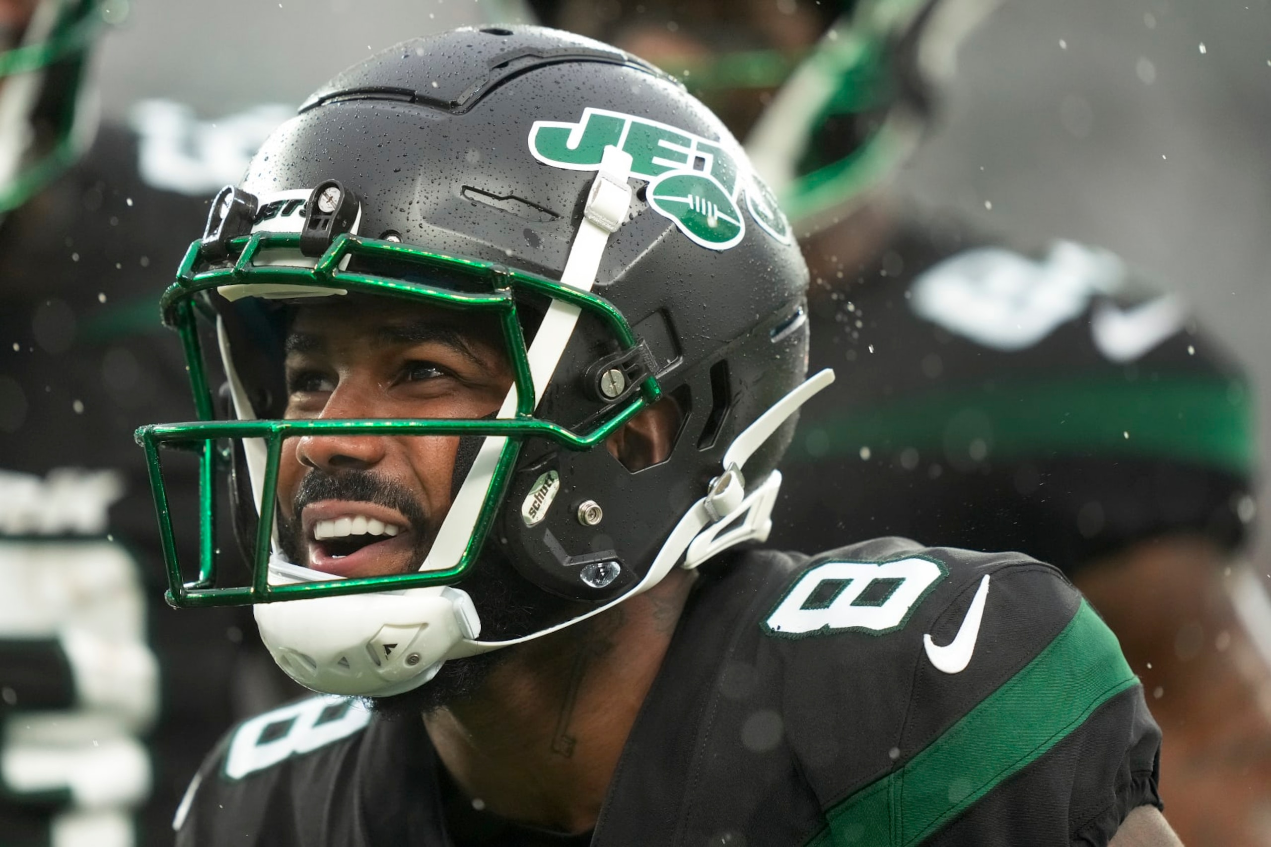 New York Jets wide receiver Elijah Moore (8) reacts against the Chicago Bears during the second quarter of an NFL football game, Sunday, Nov. 27, 2022, in East Rutherford, N.J. (AP Photo/John Minchillo) New York Jets wide receiver Elijah Moore (8) reacts against the Chicago Bears during the second quarter of an NFL football game, Sunday, Nov. 27, 2022, in East Rutherford, N.J. (AP Photo/John Minchillo)