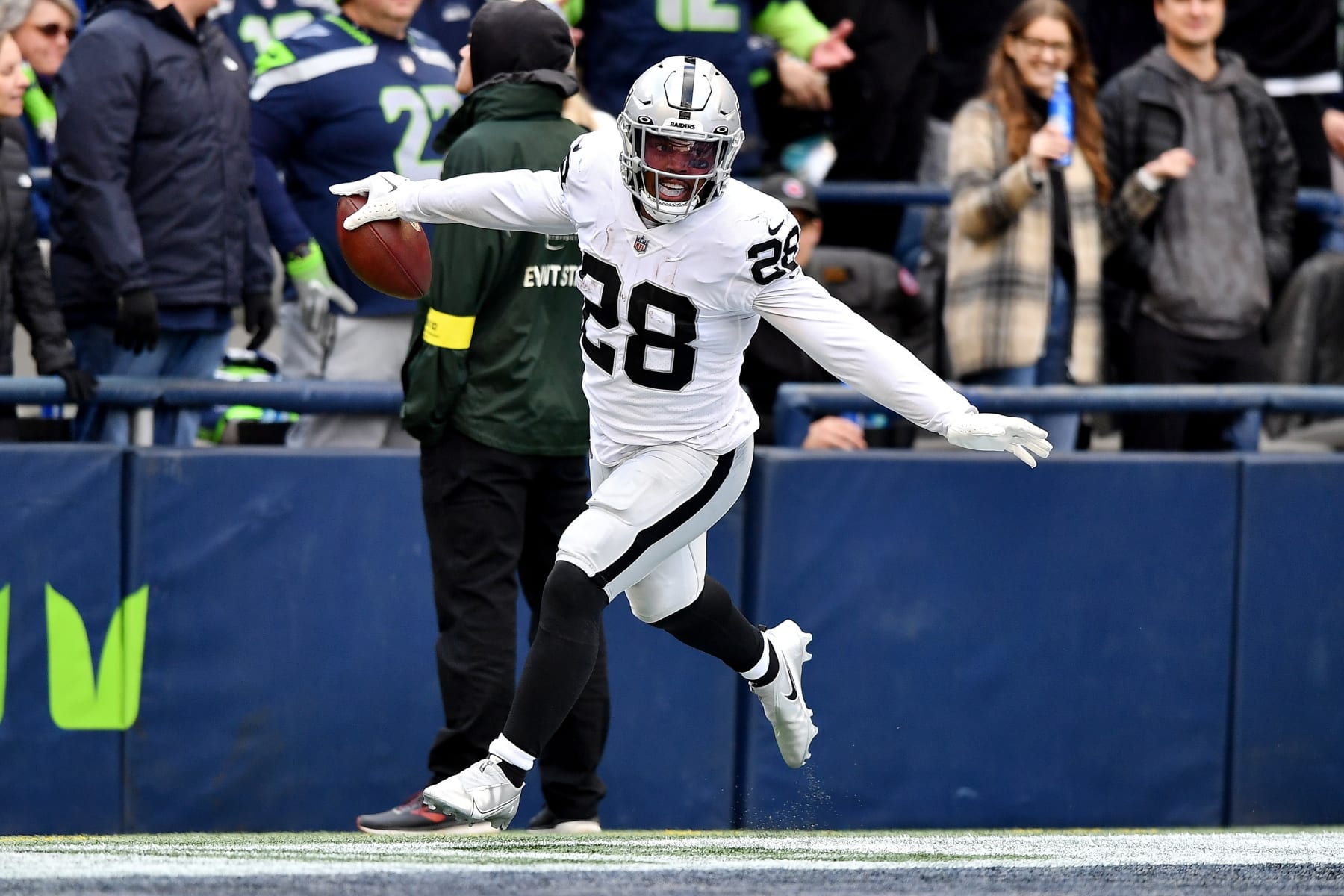 SEATTLE, WASHINGTON - NOVEMBER 27: Josh Jacobs #28 of the Las Vegas Raiders celebrates a touchdown during the first half in the game against the Seattle Seahawks at Lumen Field on November 27, 2022 in Seattle, Washington. (Photo by Jane Gershovich/Getty Images)