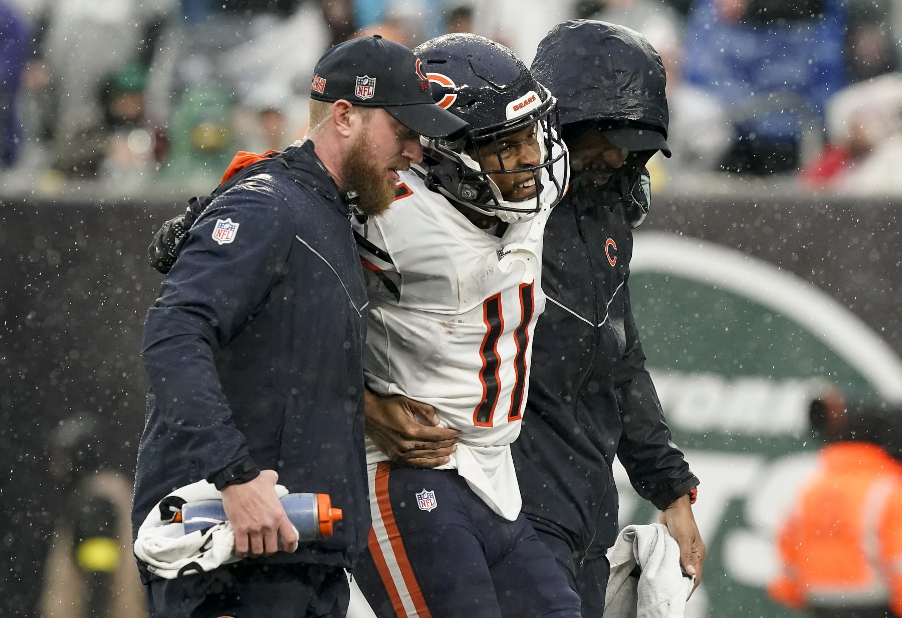 Chicago Bears wide receiver Darnell Mooney (11) is helped off the field during the third quarter of an NFL football game against the New York Jets , Sunday, Nov. 27, 2022, in East Rutherford, N.J. (AP Photo/John Minchillo) Chicago Bears wide receiver Darnell Mooney (11) is helped off the field during the third quarter of an NFL football game against the New York Jets , Sunday, Nov. 27, 2022, in East Rutherford, N.J. (AP Photo/John Minchillo)